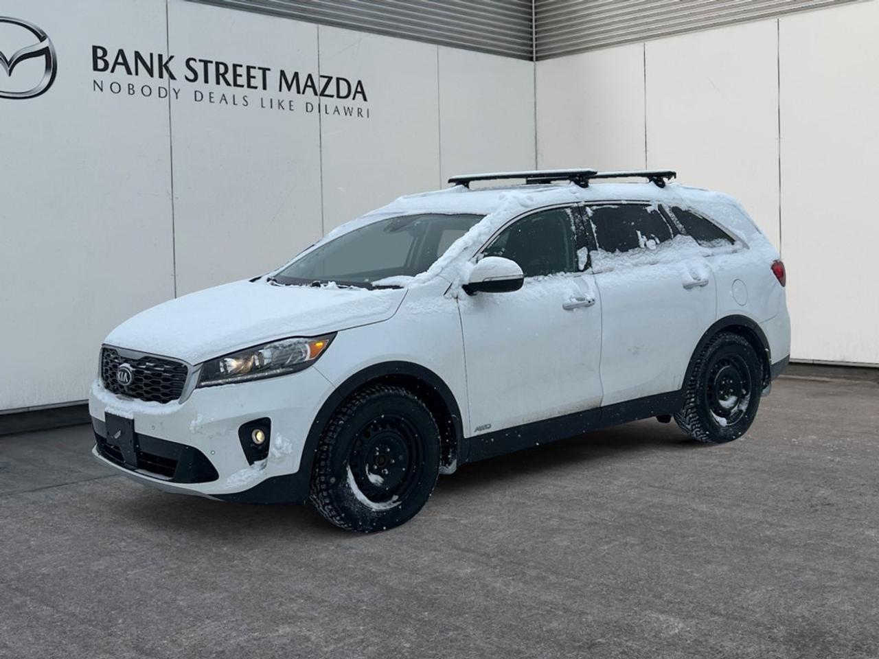 The 2020 Kia Sorento EX+ V6 AWD in a stunning White finish is the perfect combination of style, power, and capability. Equipped with an AWD system, this SUV assures confident handling on a variety of terrains, making it ideal for Canadian roads. On the outside, the alloy wheels contribute to its dynamic appearance while the sunroof/moonroof allows a natural ambiance for every drive. Inside, the leather seats provide luxury and comfort, complemented by heated seats ensuring coziness even on the chilliest days. With features such as keyless entry and power seats, everyday convenience is a given. Stay connected and entertained with smart device integration, Bluetooth connection, and an intuitive interface that keeps everything at your fingertips. Safety takes precedence with technology like the backup camera, lane assist, brake assist, and parking sensors, all designed to enhance your peace of mind while driving. Perfectly suited for families and adventure-seekers alike, the 2020 Kia Sorento EX+ is ready to elevate your driving experience. Contact us today to learn more about this versatile SUV and schedule a test drive.