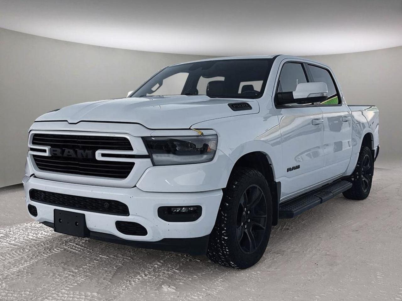 ** 2022 Ram1500 Sport 4×4  PreOwned Power Meets Premium Comfort ****Why this Ram 1500 is the onestop solution youve been waiting for**- **Muscleback performance**  5.7L HEMI VVT V8 with FuelSaver MDS and an 8speed automatic delivers relentless torque while still sipping fuel. Paired with a 3.21 rearaxle ratio, 4wheel drive and a heavyduty enginecooling system, youre ready for any terrain or tow job.- **Ready for work and play**  20inch ×9inch aluminum wheels wrapped in 275/55R20 OWL allseason tires, a robust 3,220kg GVWR, and a full Trailer Tow package (hitch, wiring, sway control) give you the confidence to haul gear, a boat, or a trailer without hesitation.- **Everyday luxury**  Front heated seats, heated steering wheel, dualzone automatic climate control, and a leatherwrapped steering wheel keep you comfortable in any weather. The 60/40 rearseat folddown, 2ndrow infloor storage bins, and rear underseat compartment add versatile cargo space.- **Tech that works for you**  Uconnect 5WW navigation on a 12inch touchscreen, 19speaker Alpine/HarmanKardon sound with subwoofer, Android Auto, Apple CarPlay, 4G LTE WiFi hotspot, and a 1year SiriusXM subscription keep you connected, entertained, and on the right route.- **Peace of mind**  Advanced safety suite includes ParkSense front/rear assist with stop, forwardcollision mitigation, lanekeep assist, adaptive cruise control with stopandgo, blindspot & crosspath detection, and a full sixairbag system. Remote start, proximity keyless entry, alarm, and Global Telematics keep your truck secure and ready at a moments notice.- **Rugged style**  Bright White exterior with black MOPAR tubular side steps, heated exterior mirrors, black dual exhaust tips, and the distinctive HEMI badge turn heads everywhere you go.**Key numbers at a glance**| Feature | Detail ||---|---|| **Engine** | 5.7L HEMI VVT V8 (FuelSaver MDS) || **Transmission** | 8speed automatic, overdrive || **Drive** | Fulltime 4×4 with electronic transfer case || **Tires / Wheels** | 275/55R20 OWL allseason, 20 ×9 aluminum || **Interior** | Black cloth lowback bucket seats, heated front seats, heated steering wheel || **Infotainment** | Uconnect 5WW, 12in. touchscreen, 19speaker Alpine, SiriusXM (1yr) || **Safety** | Adaptive cruise, lanekeep, forwardcollision mitigation, 6 airbags || **Convenience** | Remote start, keyless entry, poweradjustable pedals, dualzone A/C || **Tow capacity** | Builtin trailer hitch, sway control, brake controller |*Act fast; quality trucks like this dont stay on the lot for long!*