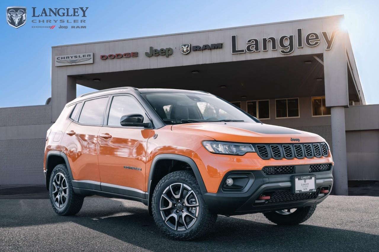 <p><strong>2026 Jeep Compass Trailhawk 4x4</strong></p><p>The Trailhawk is the specialized off-road member of the Compass family, featuring "Trail Rated" capability, increased ground clearance, and unique rugged styling for those who venture beyond the pavement.</p><p></p><ul><li><p><strong>Engine</strong>: 2.0L Turbo I-4 (200 hp, 221 lb-ft torque)</p><p></p></li><li><p><strong>Drivetrain</strong>: Jeep Active Drive Low 4x4 with 20:1 crawl ratio</p><p></p></li><li><p><strong>Towing Capacity</strong>: Up to 907 kg (2,000 lbs) when properly equipped</p><p></p></li><li><p><strong>Off-Road Hardware</strong>: Selec-Terrain® with exclusive <strong>Rock Mode</strong>, skid plates (fuel tank, transmission, transfer case), and signature red tow hooks</p><p></p></li><li><p><strong>Technology</strong>: 10.1-inch Uconnect® 5 touchscreen, wireless Apple CarPlay/Android Auto, and available 360° Surround View Camera</p><p></p></li><li><p><strong>Key Features</strong>: 17-inch gloss black wheels with all-terrain tires, anti-glare hood decal, and unique Black/Ruby Red interior accents</p><p></p></li></ul><p>Come book a test drive at Langley Chrysler, conveniently located in Langley, British Columbia.</p>*All new vehicle purchases are plus the PDI accessory installs and any price increases provided by the manufacturer. For trucks the accessories will include wheel locks, spray-in liners, and mud flaps. For all other vehicles, wheel locks are standard, other equipment may apply. Confirm with the dealer.

<p>*All prices are net of all manufacturer incentives and/or rebates and are subject to change by the manufacturer without notice. All prices plus applicable taxes, applicable environmental recovery charges, documentation of $599 and full tank of fuel surcharge of $76 if a full tank is chosen.<br />Other items available that are not included in the above price:<br />Tire & Rim Protection and Key fob insurance starting from $599<br />Service contracts (extended warranties) for up to 7 years and 200,000 kms starting from $599<br />Custom vehicle accessory packages, mudflaps and deflectors, tire and rim packages, lift kits, exhaust kits and tonneau covers, canopies and much more that can be added to your payment at time of purchase<br />Undercoating, rust modules, and full protection packages starting from $199<br />Flexible life, disability and critical illness insurances to protect portions of or the entire length of vehicle loan?im?im<br />Financing Fee of $500 when applicable<br />Prices shown are determined using the largest available rebates and incentives and may not qualify for special APR finance offers. See dealer for details. This is a limited time offer.</p>