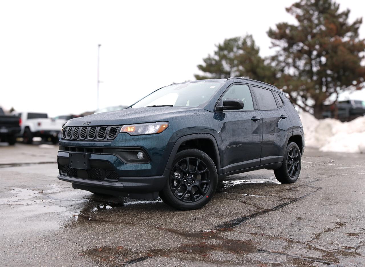Your adventure begins in our New 2026 Jeep Compass North 4X4 in Fathom Blue Pearl-Coat w/ Black with the Altitude Special Edition. Motivated by a TurboCharged 2.0 Litre 4 Cylinder providing 200hp to an 8 Speed Automatic transmission with multiple terrain modes so you can explore your way. Also nimble and easy to maneuver in town or on the trail, this Four Wheel Drive achieves approximately 7.4L/100km on the highway. Our Compass showcases modern Jeep styling with signature lighting, gloss black grille surround, rugged body cladding, 18-inch Gloss Black-painted alloy wheels, and power-adjustable mirrors that enhance its bold presence.  Our North cabin is thoughtfully equipped for daily travel with supportive cloth seating, a multifunction steering wheel, automatic climate control, cruise control, pushbutton ignition, keyless entry, a digital driver display, and generous storage space. Uconnect&reg; technology anchors a 10.1-inch touchscreen with Apple CarPlay&reg;, Android Auto&reg;, Bluetooth&reg; connectivity, available WiFi services, and an integrated audio system.  Another Jeep advantage is its sophisticated safety technology. You can feel well protected knowing blind-spot monitoring, hill-start assist, automatic braking, active lane management, a rearview camera, forward collision warning, a driver attention monitor, tire pressure monitoring, and more. Our Compass North is a compact SUV leader with features like those! Save this Page and Call for Availability. We Know You Will Enjoy Your Test Drive Towards Ownership!
