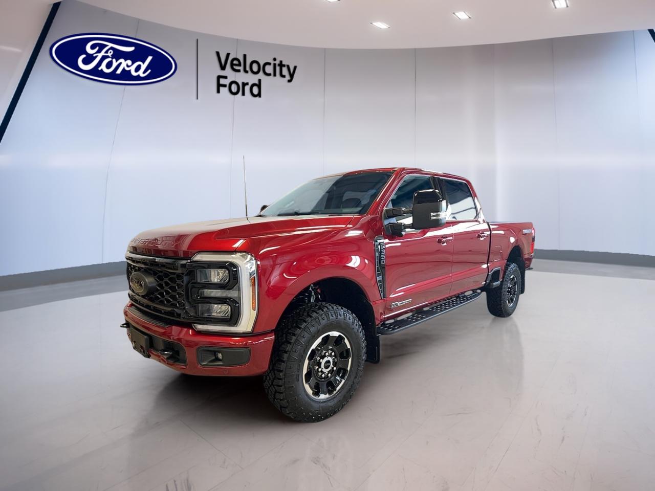 Discover the brand new 2026 Ford Super Duty F-350 SRW LARIAT Crew Cab, now available at Velocity Ford in Moose Jaw. With its bold red exterior and refined black interior, this four-door powerhouse is engineered for those who demand uncompromising performance and advanced technology. The 6.7-litre diesel engine, paired with automatic transmission and four-wheel drive, ensures youre always ready for the toughest jobs or the longest journeys.

TRUCK FEATURES
»» Towing capacity of 6,213 kg for heavy loads
»» Four-wheel drive (4WD) for superior traction
»» Rear tow hook for added utility
»» Retractable mirrors for improved maneuverability

ADVANCED SAFETY FEATURES
»» Anti-lock braking system (ABS) for safer stops
»» Blind spot monitor for greater awareness
»» Side impact and head side airbags for protection
»» Child safety locks for peace of mind

PERFORMANCE AND EFFICIENCY
»» 6.7-litre diesel engine delivers robust power
»» Automatic transmission for seamless shifting
»» Limited slip differential for enhanced stability
»» Dual shift mode transmission for versatility

COMFORT AND CONVENIENCE
»» Dual-zone and automatic climate control
»» Heated front seats for cold weather comfort
»» Memory seats and memory mirrors for customization
»» Adjustable pedals for personalized driving position

TECHNOLOGY AND CONNECTIVITY
»» Navigation system (GPS) for easy route planning
»» Bluetooth integration for hands-free calls
»» WiFi hotspot keeps you connected on the go
»» HD radio and satellite radio for entertainment

CARGO SPACE
»» Rear trunk access for easy loading
»» Spare tire included for emergencies
»» Ample storage with four-door configuration
»» Rear window defroster for clear visibility

WHAT OTHER OWNERS LIKE
»» Exceptional towing and hauling capabilities
»» Advanced safety and driver assistance features
»» Comfortable and spacious interior layout
»» User-friendly technology and connectivity options

This 2026 Ford Super Duty F-350 SRW LARIAT Crew Cabs VIN is: 1FT8W3BT9TED27742.