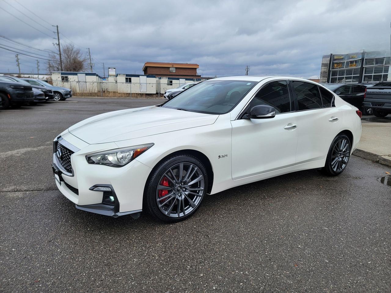 <p data-start=0 data-end=39><strong data-start=0 data-end=39>2018 INFINITI Q50 RED SPORT 400 AWD</strong></p><p data-start=41 data-end=293>Experience true performance luxury with this <strong data-start=86 data-end=111>Q50 Red Sport 400 AWD</strong> &mdash; one of the most powerful sport sedans in its class. Sharp styling, refined interior, and serious twin-turbo performance make this a driver&rsquo;s car that still delivers daily comfort.</p><p data-start=295 data-end=309><strong data-start=295 data-end=309>Highlights</strong></p><ul data-start=310 data-end=523><li data-start=310 data-end=351><p data-start=312 data-end=351>3.0L Twin-Turbo V6 &mdash; <strong data-start=333 data-end=351>400 horsepower</strong></p></li><li data-start=352 data-end=385><p data-start=354 data-end=385>Intelligent <strong data-start=366 data-end=385>All-Wheel Drive</strong></p></li><li data-start=386 data-end=426><p data-start=388 data-end=426>7-speed automatic with paddle shifters</p></li><li data-start=427 data-end=472><p data-start=429 data-end=472>Sport-tuned suspension & performance brakes</p></li><li data-start=473 data-end=523><p data-start=475 data-end=523>Dynamic Digital Suspension (Red Sport exclusive)</p></li></ul><p data-start=525 data-end=537><strong data-start=525 data-end=537>Features</strong></p><ul data-start=538 data-end=844><li data-start=538 data-end=582><p data-start=540 data-end=582>Red Sport sport seats with premium leather</p></li><li data-start=583 data-end=602><p data-start=585 data-end=602>Navigation system</p></li><li data-start=603 data-end=623><p data-start=605 data-end=623>Bose premium audio</p></li><li data-start=624 data-end=633><p data-start=626 data-end=633>Sunroof</p></li><li data-start=634 data-end=659><p data-start=636 data-end=659>Adaptive cruise control</p></li><li data-start=660 data-end=683><p data-start=662 data-end=683>Blind spot monitoring</p></li><li data-start=684 data-end=708><p data-start=686 data-end=708>Lane departure warning</p></li><li data-start=709 data-end=739><p data-start=711 data-end=739>Front & rear parking sensors</p></li><li data-start=740 data-end=777><p data-start=742 data-end=777>LED headlights & signature lighting</p></li><li data-start=778 data-end=816><p data-start=780 data-end=816>Keyless entry with push-button start</p></li><li data-start=817 data-end=844><p data-start=819 data-end=844>Dual-zone climate control</p></li></ul><p data-start=846 data-end=1087><strong data-start=846 data-end=873>Why This Q50 Red Sport?</strong><br data-start=873 data-end=876>This is the top-tier Q50 &mdash; not a base model. You get real power, confident AWD handling, and Infiniti luxury wrapped in a sleek, aggressive design. Fast, comfortable, and refined without sacrificing performance.</p><p data-start=1089 data-end=1159>A perfect blend of <strong data-start=1108 data-end=1158>sport sedan performance and everyday usability</strong>.</p><p><strong>Additional Certification Cost</strong>: The full certification cost for this vehicle is <strong>$790 + HST</strong>.</p><p><strong>What&rsquo;s Included with Certification</strong>:</p><ul><li>The vehicle will be delivered with a <strong>valid safety certification</strong> and a <strong>36-day safety item warranty</strong> for your peace of mind.</li><li>A <strong>fresh oil change</strong> will be performed, and all fluids will be topped up.</li><li>The vehicle will be <strong>professionally detailed</strong>, ensuring it looks and feels like new when you pick it up.</li></ul><p>At <strong>Twin Oaks Auto</strong>, we are committed to providing a <strong>hassle-free car buying experience</strong>. From your first inquiry to driving off in your new car, our goal is to get you on the road quickly and stress-free!</p><p><strong>Financing Options Available!</strong><br>Flexible financing options are available to suit your needs. Contact us for more details.</p><p><strong>Contact Us Today</strong>:<br>📞 <strong>Call Us</strong>: 905-339-3330<br>📍 <strong>Location</strong>: 2470 Royal Windsor Drive, Oakville, Ontario, L6J 7Y2</p><p><br>(Conveniently located between Ford Drive and Winston Churchill Blvd.)</p><p><strong>More Information</strong>:<br>Visit our website at <strong><a href=http://www.twinoaksauto.com>TwinOaksAuto.com</a></strong> to view additional pictures, explore our inventory, and access CARFAX reports.</p><p>&nbsp;</p>
