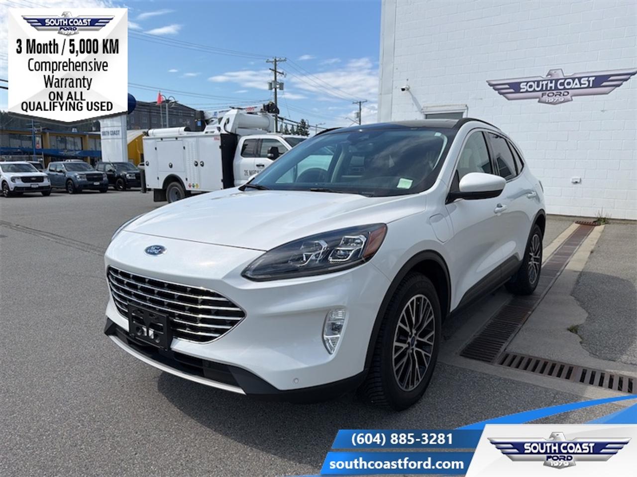<b>Low Mileage, Sunroof, Heated Seats!</b><br> <br> <p style=color:Blue;><b>Upgrade your ride at South Coast Ford with peace of mind! Our used vehicles come with a minimum of 5,000 km and 3 months of Comprehensive Vehicle Warranty. Drive with confidence knowing your investment is protected.</b></p><br> <br> Compare at $31920 - Our Price is just $30990! <br> <br>With an interior that easily adapts to your needs and keeps all your equipment hidden, the Ford Escape is the perfect partner for the spontaneous adventurer. This 2022 Ford Escape is fresh on our lot in Sechelt.<br> <br>The Ford Escape was built for an active lifestyle and offers plenty of options for you to hit the road in your own individual style. Whether you need a family SUV for soccer practice, a capable adventure vehicle, or both, the versatile Ford Escape has you covered. Built for those who live on the go, the Ford Escape was made to be unstoppable.<br> <br>This low mileage SUV has just 27,958 km. Its Star White Metallic Tri-Coat in colour. It has an Automatic transmission and is powered by a 2.5L 4 Cylinder Engine. It may have some remaining factory warranty, please check with dealer for details. <br> <br> Our Escapes trim level is Titanium Plug-In Hybrid. Stepping up to this premium Ford Escape Titanium Hybrid is a great choice as it comes fully loaded with heated sport contour premium seats that are powered in the front, exclusive aluminum wheels and Fords SYNC 3 infotainment system complete with a large touchscreen, integrated navigation, Apple CarPlay and Android Auto. Additional features include a power rear liftgate, heated leatherette steering wheel, SiriusXM radio paired with a premium Bang and Olufsen audio system, FordPass Connect 4G LTE, automatic climate control, a smart device remote starter plus unique exterior accents. For added convenience and safety this Ford Escape also comes with active park assist, Ford Co-Pilot360 that features lane keep assist, active park assist, blind spot detection, automatic emergency braking with evasion assist and cross traffic alert plus so much more. This vehicle has been upgraded with the following features: Sunroof, Heated Seats.<br> To view the original window sticker for this vehicle view this <a href=http://www.windowsticker.forddirect.com/windowsticker.pdf?vin=1FMCU0LZ4NUA41030 target=_blank>http://www.windowsticker.forddirect.com/windowsticker.pdf?vin=1FMCU0LZ4NUA41030</a>. <br/><br> <br>To apply right now for financing use this link: <a href=https://www.southcoastford.com/financing/ target=_blank>https://www.southcoastford.com/financing/</a><br> <br/>Buy this vehicle now for the lowest bi-weekly payment of <b>$254.86</b> with $0 down for 84 months @ 7.99% APR O.A.C. (All rates are OAC. Check with our team for rate specials on new and used vehicles. Banks will have financed minimum amounts for certain rates. / Total Obligation of $42582 ). See dealer for details. <br><br>Call South Coast Ford Sales or come visit us in person. Were convenient to Sechelt, BC and located at 5606 Wharf Avenue. and look forward to helping you with your automotive needs.<br><br> Come by and check out our fleet of 20+ used cars and trucks and 90+ new cars and trucks for sale in Sechelt.  o~o