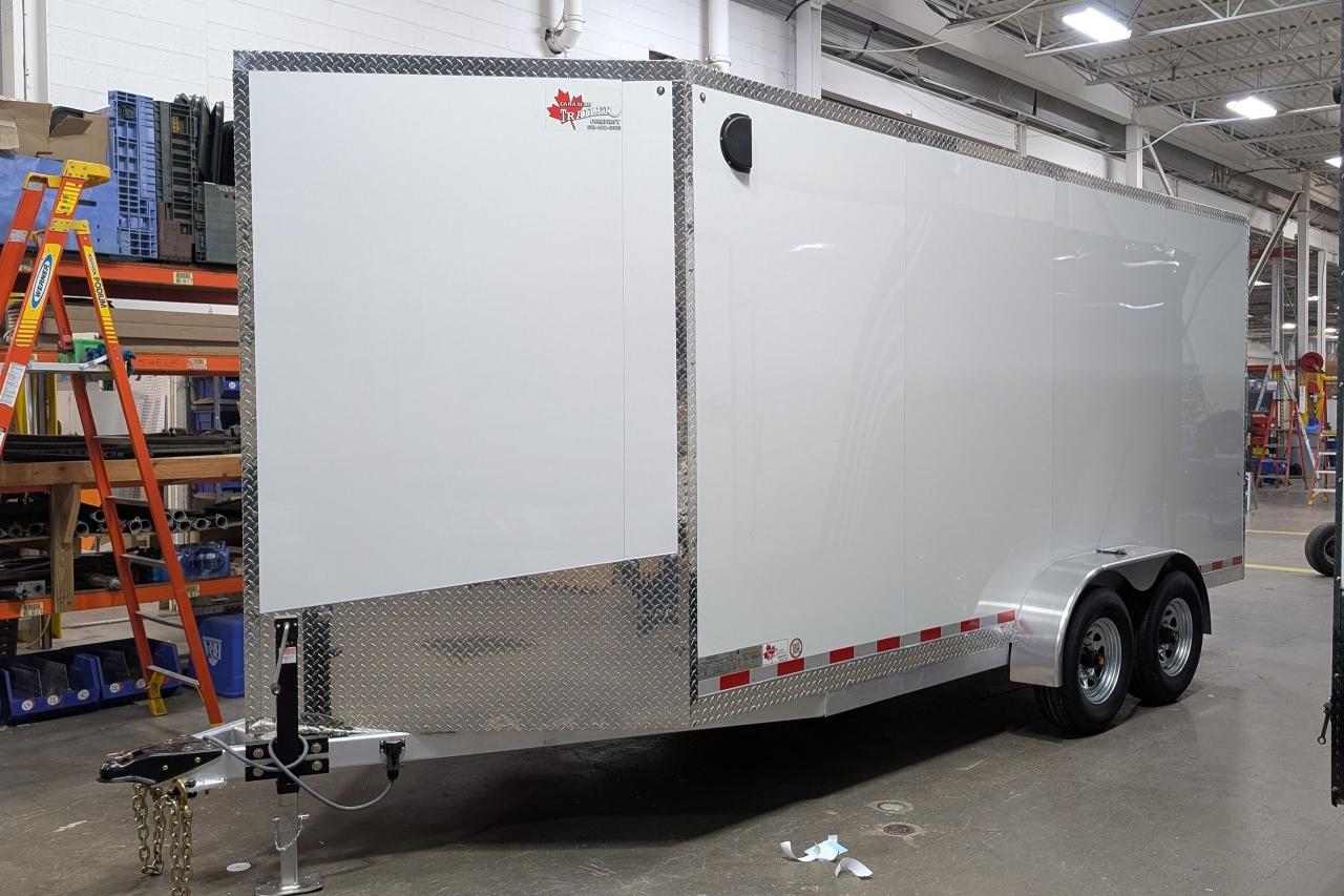 <p>2025&nbsp;Canadian Trailer Company 7x16&nbsp;Aluminum Tandem Axle Enclosed Cargo Trailer&nbsp;</p><p><strong>Features include:</strong></p><ul><li>Height: 7</li><li>5200 lb Straight Axles</li><li>Heavy Duty 2x4 1/4 A-frame&nbsp;with additional main frame supports</li><li>Rear Ramp Door</li><li>8000 lb side-mount jack</li><li>One-piece Translucent Fiberglass Roof</li><li>Warp-Resistant Composite Cladding</li><li>GPS Tracker with 1-year subscription</li><li>Aluminum Bar locks with Stainless Steel Hasps (on rear door & man door)</li><li>Weight: 1075 kg</li></ul><p><strong>What makes a Canadian Trailer Company cargo trailer better than the competition?</strong></p><ul><li>HD 3/16 A-frame&nbsp;<strong>STANDARD&nbsp;</strong>&ndash;&nbsp;<strong>50% THICKER</strong>&nbsp;plus centre pole&nbsp;<strong>STANDARD&nbsp;</strong>(Competition: 1/8&rdquo; A-frame)</li><li>Side runners extend to back wheel wells&nbsp;<strong>STANDARD&nbsp;</strong>(Competition: N/A)</li><li>HD &frac12;&rdquo; A-frame plate with Heavy Duty Clevis & Grade 7 chains/hooks&nbsp;<strong>STANDARD&nbsp;</strong>(Competition: No A-frame plate, industry standard chain/hooks, no clevis)</li><li>Roof, walls & floor - studs 16&rdquo; on centre , 1/8&rdquo; tube&nbsp;<strong>STANDARD &ndash; built for Canadian snow load</strong>&nbsp;(Competition: studs 16&rdquo;-24&rdquo; roof, walls, floor)</li><li>Ramp Door included&nbsp;<strong>STANDARD&nbsp;</strong>(Competition: Upgrade cost $$$)</li><li>Stainless Steel screws, nuts, bolts, washers&nbsp;<strong>STANDARD&nbsp;</strong>&ndash; where applicable (Competition: Steel)</li><li>Interior &ndash; &frac12;&rdquo; plywood walls, &frac34;&rdquo; plywood floor, finished one side&nbsp;<strong>STANDARD&nbsp;</strong>(Competition: 3/8&rdquo; Drymax/Chipboard walls & &frac34;&rdquo; Drymax/Chipboard floor)</li><li>All interior trimmed out &ndash; floor, ceiling, corners&nbsp;<strong>STANDARD&nbsp;</strong>(Competition: no trim on most)</li><li>45-degree angle nose - excellent fuel economy&nbsp;<strong>STANDARD&nbsp;</strong>(Competition: Short/flat nose)</li><li>Screwless smooth exterior cladding&nbsp;<strong>STANDARD&nbsp;</strong>(Competition: Cladding full of screws/rivets that pop/rust)</li><li>3 Year limited warranty&nbsp;<strong>STANDARD&nbsp;</strong>(Competition: most 1 year)</li><li>Buy direct from the manufacturer &ndash; no added expense pushed to the customer (Competition: Dealer/Distributor/Broker</li></ul><p>&nbsp;</p><p>Taxes & licensing fees are additional. This trailer is currently located at the Canadian Trailer Company factory, Goderich.</p>