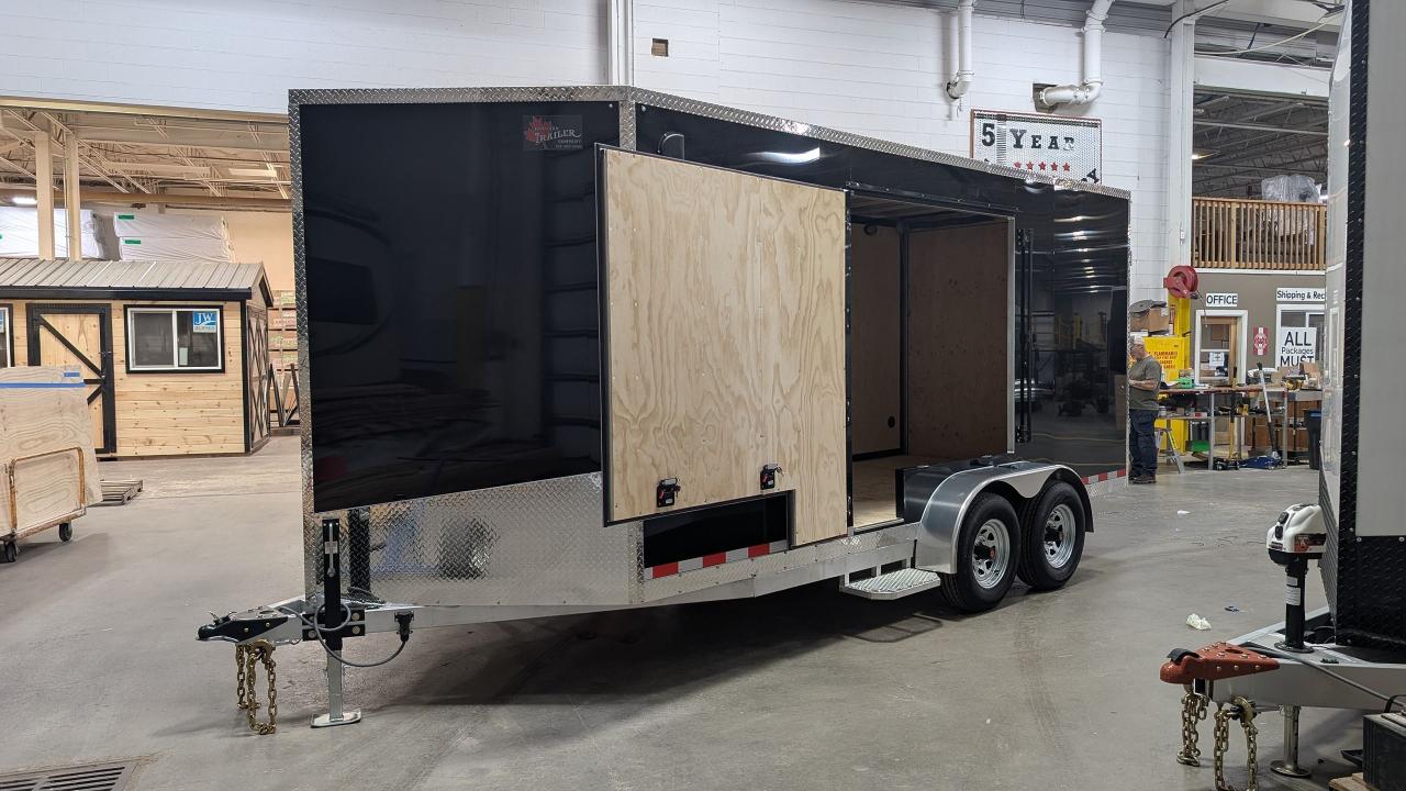 <p>Elevate your hauling with the 2025 Canadian Trailer Company 7x16 aluminum cargo trailer, proudly manufactured in Goderich, ON. Designed with a versatile jump door and a rear ramp door, it offers 7 height, 5200 lb straight axles, and an 8000 lb jack to handle heavy loads effortlessly. The warp-resistant composite cladding, mesh steps, and aluminum bar locks with stainless steel hasps ensure durability and security. Featuring a GPS tracker with a 1-year subscription, this trailer keeps you in control and on track. Experience premium quality with Canadian manufacturing you can trust!</p><p><strong>Features include:</strong></p><ul><li>Height: 7</li><li>5200 lb Straight Axles</li><li>Rear Ramp Door</li><li>8000 lb jack</li><li>Warp-Resistant Composite Cladding</li><li>Jump Door</li><li>Mesh Steps (at man door and jump door)</li><li>GPS Tracker with 1-year subscription</li><li>Aluminum&nbsp;Bar locks with Stainless Steel Hasps&nbsp;(on all doors)</li></ul><p><strong>What makes a Canadian Trailer Company cargo trailer better than the competition?</strong></p><ul><li>HD 3/16 A-frame&nbsp;<strong>STANDARD&nbsp;</strong>&ndash;&nbsp;<strong>50% THICKER</strong>&nbsp;plus centre pole&nbsp;<strong>STANDARD&nbsp;</strong>(Competition: 1/8&rdquo; A-frame)</li><li>Side runners extend to back wheel wells&nbsp;<strong>STANDARD&nbsp;</strong>(Competition: N/A)</li><li>HD &frac12;&rdquo; A-frame plate with Heavy Duty Clevis & Grade 7 chains/hooks&nbsp;<strong>STANDARD&nbsp;</strong>(Competition: No A-frame plate, industry standard chain/hooks, no clevis)</li><li>Roof, walls & floor - studs 16&rdquo; on centre , 1/8&rdquo; tube&nbsp;<strong>STANDARD &ndash; built for Canadian snow load</strong>&nbsp;(Competition: studs 16&rdquo;-24&rdquo; roof, walls, floor)</li><li>Ramp Door included&nbsp;<strong>STANDARD&nbsp;</strong>(Competition: Upgrade cost $$$)</li><li>Stainless Steel screws, nuts, bolts, washers&nbsp;<strong>STANDARD&nbsp;</strong>&ndash; where applicable (Competition: Steel)</li><li>Interior &ndash; &frac12;&rdquo; plywood walls, &frac34;&rdquo; plywood floor, finished one side&nbsp;<strong>STANDARD&nbsp;</strong>(Competition: 3/8&rdquo; Drymax/Chipboard walls & &frac34;&rdquo; Drymax/Chipboard floor)</li><li>All interior trimmed out &ndash; floor, ceiling, corners&nbsp;<strong>STANDARD&nbsp;</strong>(Competition: no trim on most)</li><li>45-degree angle nose - excellent fuel economy&nbsp;<strong>STANDARD&nbsp;</strong>(Competition: Short/flat nose)</li><li>Screwless smooth exterior cladding&nbsp;<strong>STANDARD&nbsp;</strong>(Competition: Cladding full of screws/rivets that pop/rust)</li><li>3 Year limited warranty&nbsp;<strong>STANDARD&nbsp;</strong>(Competition: most 1 year)</li><li>Buy direct from the manufacturer &ndash; no added expense pushed to the customer (Competition: Dealer/Distributor/Broker)</li></ul><p>Taxes & licensing fees are additional. This trailer is currently located at the Canadian Trailer Company factory, Goderich.</p>