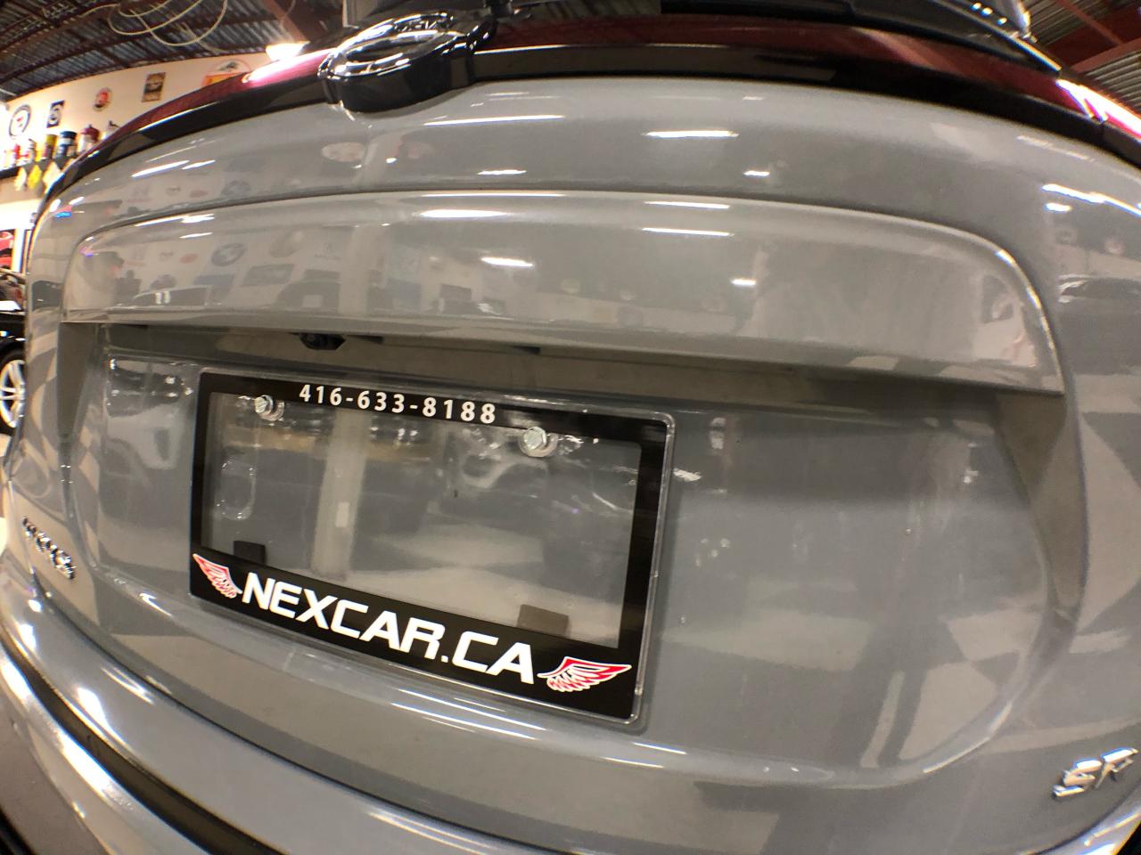 2021 Nissan Kicks SR LEATHER A/C A/CARPLAY L/ASSIST B/SPOT CAMERA Photo