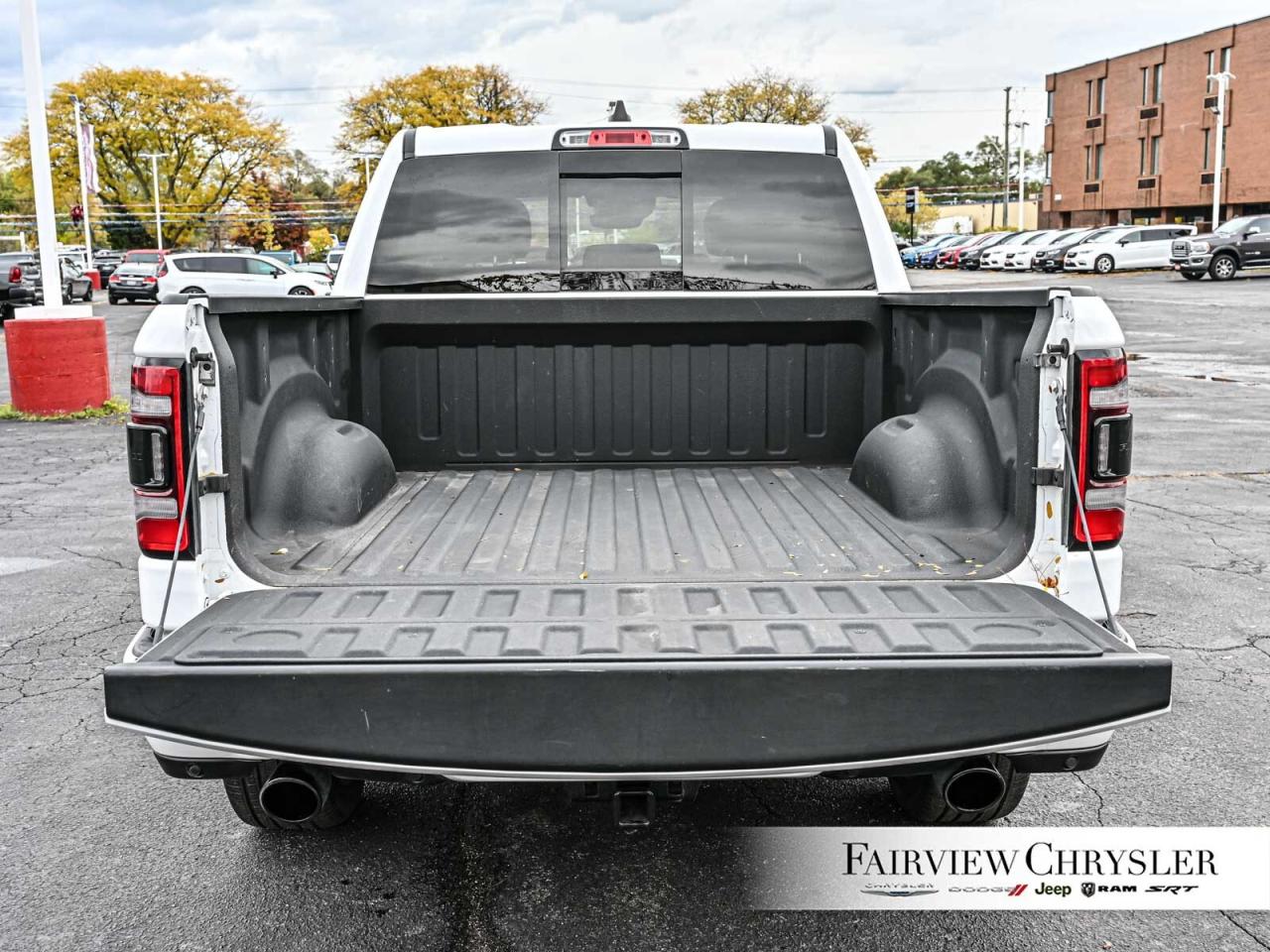 2023 RAM 1500 Sport G/T PKG   SPORT HOOD   SPRAY IN   CLASS IV Photo