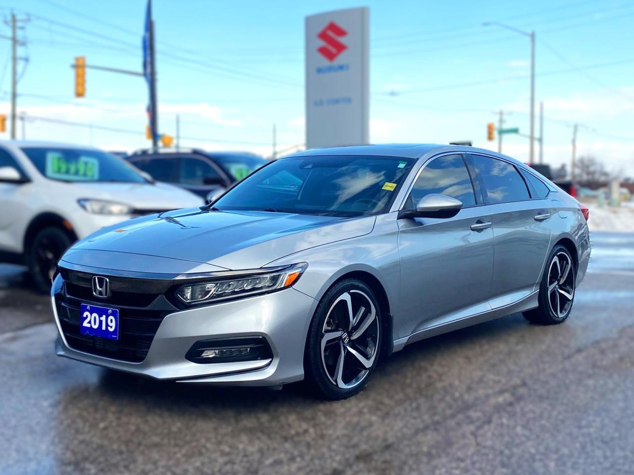 This 2019 Honda Accord Sport is a turbocharged sport sedan thats sharper than a fresh haircut and smoother than your favorite playlist. With the punchy 1.5L turbo engine and 141,374 km, this no-accident, certified, deep-cleaned ride is loaded with features to make every drive feel like a thrill.  Whats the deal? ~Heated seats - Toasty comfort when the weather turns chilly.  ~Power sunroof - Drop in sunshine or flex under the stars.  ~Bluetooth - Blast your anthems or argue with Siri mid-merge.  ~Backup camera - Parking so slick youll look like a pro.  ~LED headlights - Light up the road like you own the night.  ~Android Auto & Apple CarPlay - Your phone, bigger and better on the dash.  ~Blind Spot Alert - Watches your back better than your co-pilot.  ~1.5L turbo engine - 192 hp of grin-inducing boost with smooth shifting.   Mileage: 141,374 km -this Accord still has plenty of highway smiles left. Price: A deal so sweet, youll think were tossing in free bubble tea! (Were not, but its that good.)   The Deal: Certified, no accidents, and scrubbed cleaner than your kitchen before a potluck -this Honda Accord Sport is the perfect mix of turbo fun, tech, and legendary reliability for daily drives or weekend thrills.  Disclaimer: Buying this Accord is like adopting a stealthy sport sedan -its fast, sharp, and might tempt you to take the long way home just to enjoy the turbo kick. Seller not responsible for spontaneous late-night cruises, jealous stares from boring sedans, or you refusing to park because those heated seats are just too perfect. Drive fast, live bold!  Contact us to snag this awesome Accord!  G. D. Coates - The Original Used Car Superstore!       Our Financing: We have financing for everyone regardless of your history. We have been helping people rebuild their credit since 1973 and can get you approvals other dealers cant. Our credit specialists will work closely with you to get you the approval and vehicle that is right for you. Come see for yourself why were known as The Home of The Credit Rebuilders!       Our Warranty: G. D. Coates Used Car Superstore offers fully insured warranty plans catered to each customers individual needs. Terms are available from 3 months to 7 years and because our customers come from all over, the coverage is valid anywhere in North America.       Parts & Service: We have a large eleven bay service department that services most makes and models. Our service department also includes a cleanup department for complete detailing and free shuttle service. We service what we sell! We sell and install all makes of new and used tires. Summer, winter, performance, all-season, all-terrain and more! Dress up your new car, truck, minivan or SUV before you take delivery! We carry accessories for all makes and models from hundreds of suppliers. Trailer hitches, tonneau covers, step bars, bug guards, vent visors, chrome trim, LED light kits, performance chips, leveling kits, and more! We also carry aftermarket aluminum rims for most makes and models.       Our Story: Family owned and operated since 1973, we have earned a reputation for the best selection, the best reconditioned vehicles, the best financing options and the best customer service! We are a full service dealership with a massive inventory of used cars, trucks, minivans and SUVs. Chrysler, Dodge, Jeep, Ford, Lincoln, Chevrolet, GMC, Buick, Pontiac, Saturn, Cadillac, Honda, Toyota, Kia, Hyundai, Subaru, Suzuki, Volkswagen - Weve Got Em! Come see for yourself why G. D. Coates Used Car Superstore was voted Barries Best Used Car Dealership!