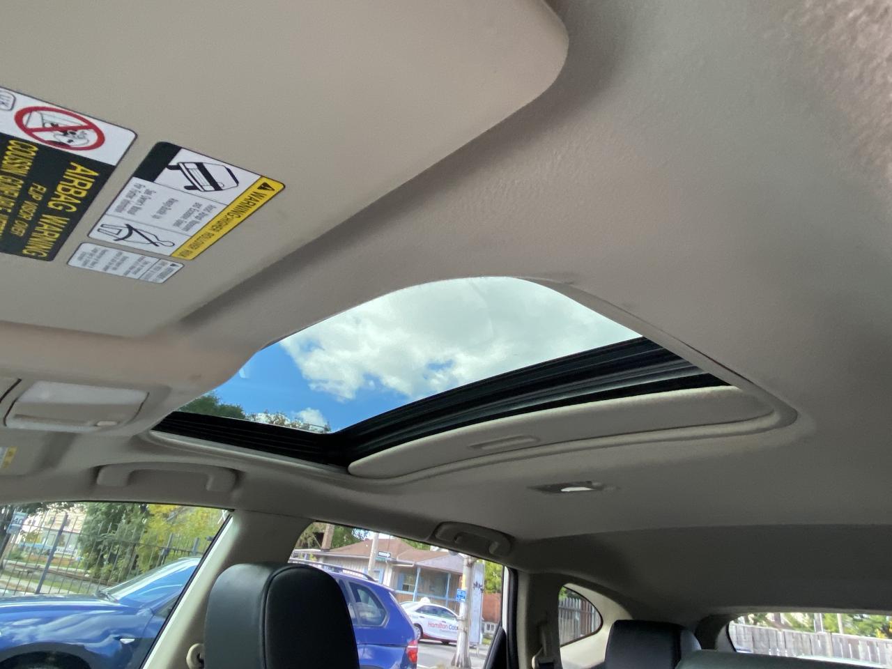 2012 Nissan Rogue AWD 4dr SL Photo4