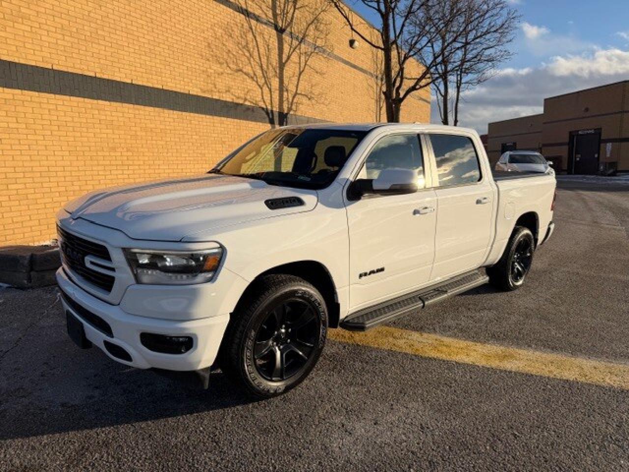 2023 RAM 1500 Sport   LEVEL 2 EQUIPMENT   eTorque   HEMI Photo