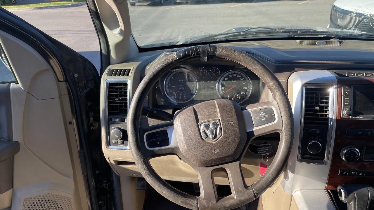 2011 RAM 1500 AS IS   4WD Crew Cab 140.5  Laramie Photo