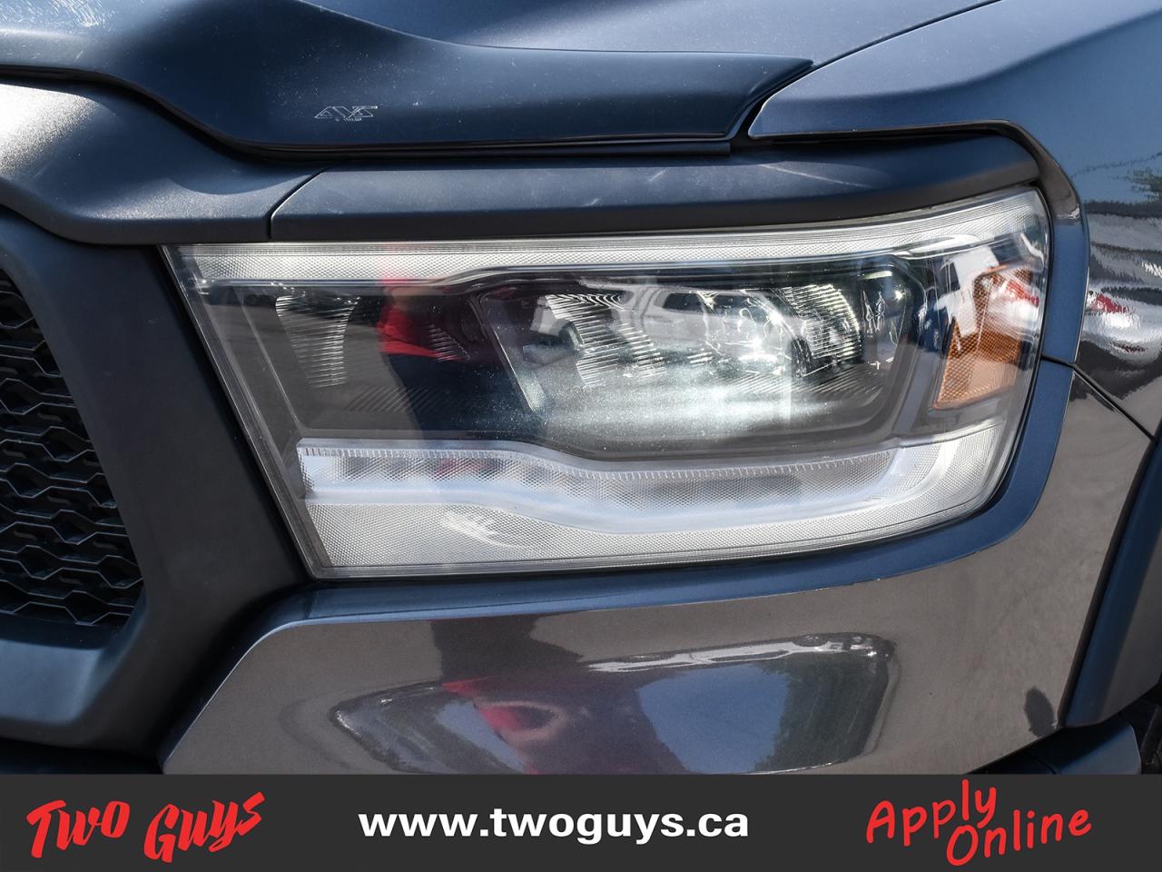 2022 RAM 1500 Rebel 5.7L 4WD Quad   Night Edition   Level 2 Grou Photo