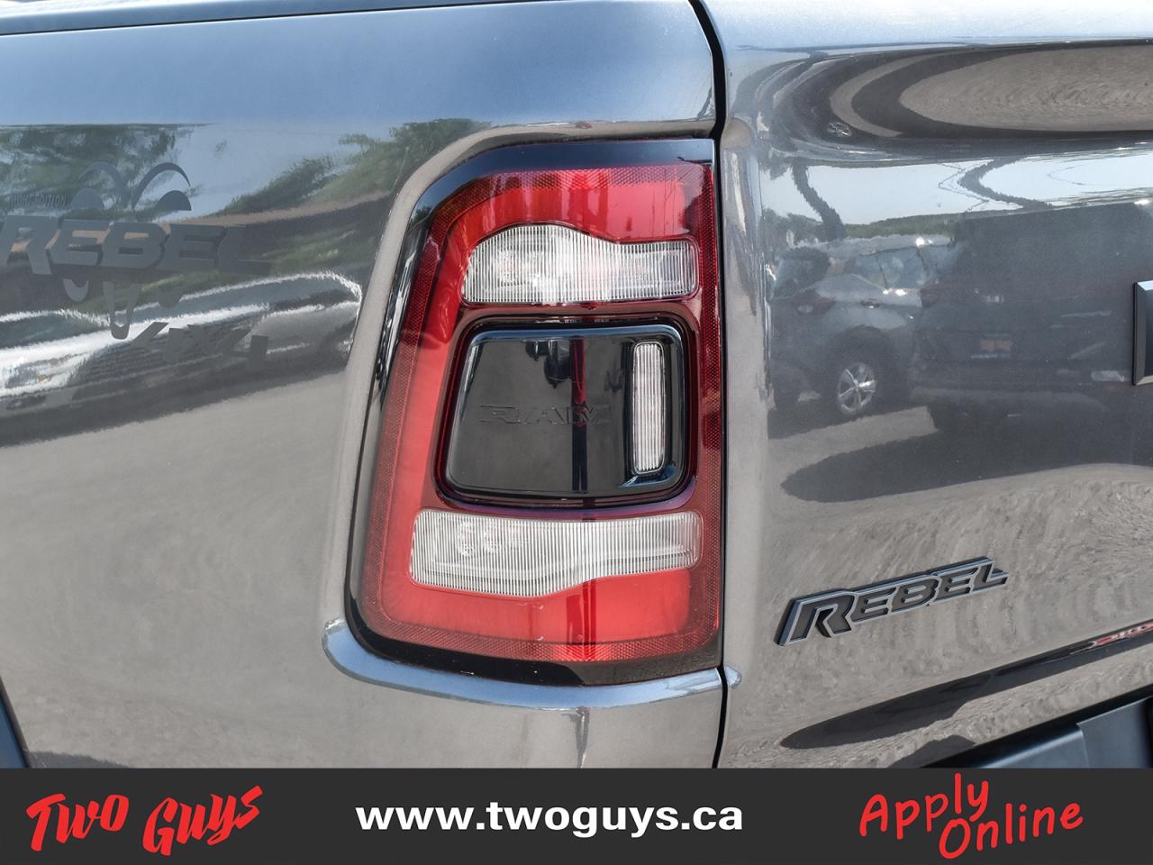 2022 RAM 1500 Rebel 5.7L 4WD Quad   Night Edition   Level 2 Grou Photo