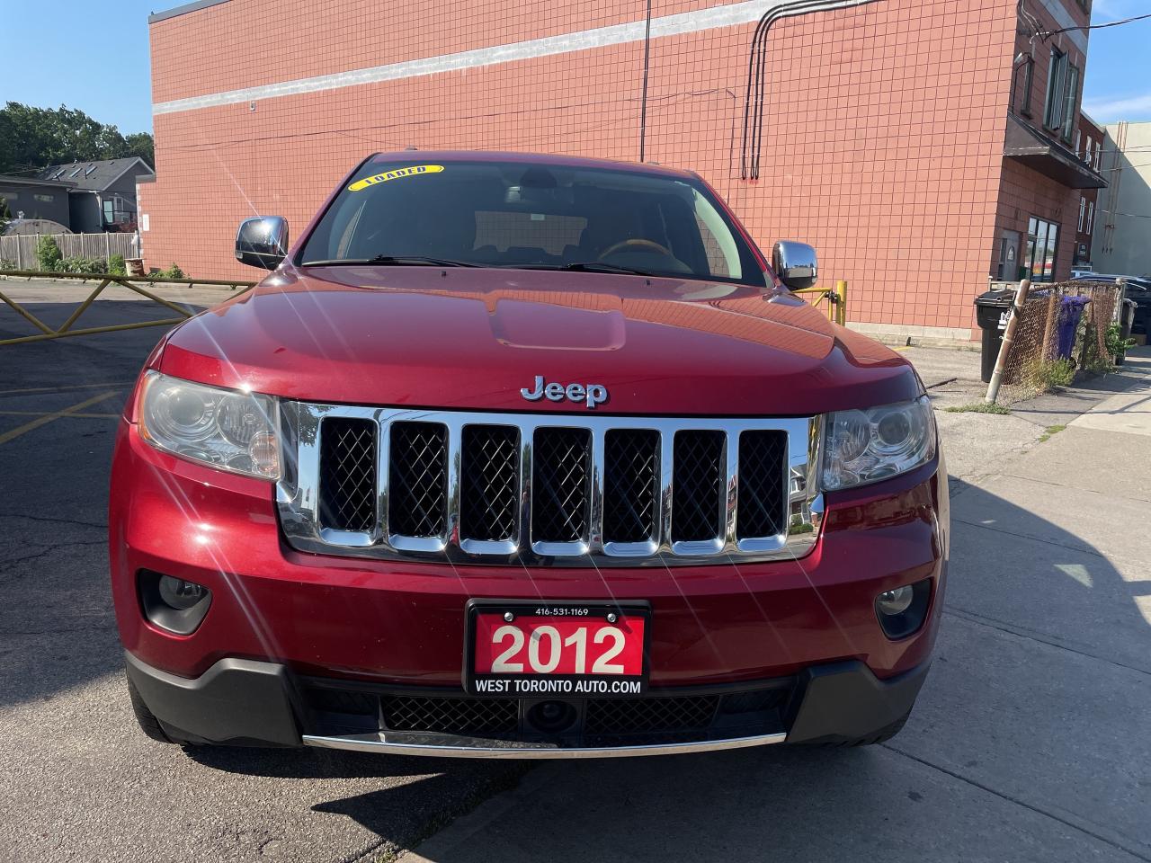 2012 Jeep Grand Cherokee Overland / 4X4/ NAVI / S ROOF / LEATHER / CLEAN Photo