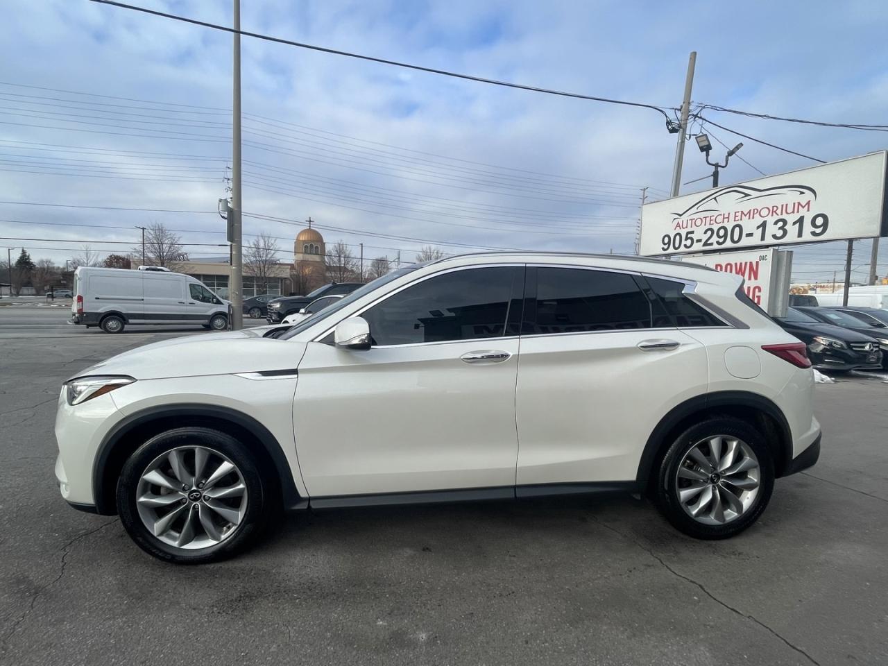 2021 Infiniti QX50 LUXE AWD Pearl white Leather   PRO PILOT   Htd Sea Photo2