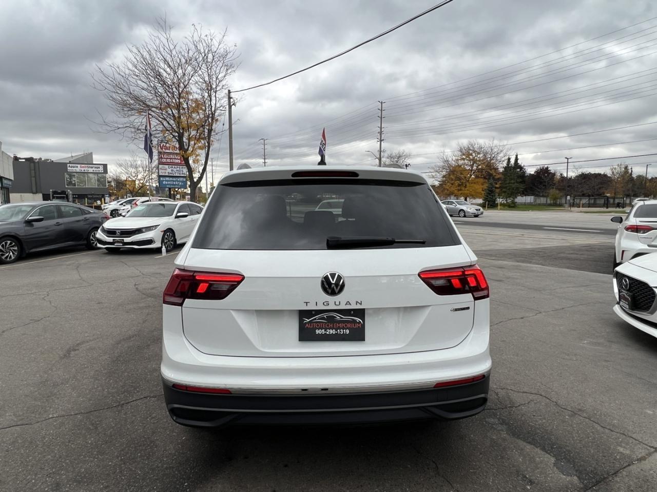 2023 Volkswagen Tiguan Comfortline 4Motion Pearl White   Pano Roof   Leat Photo