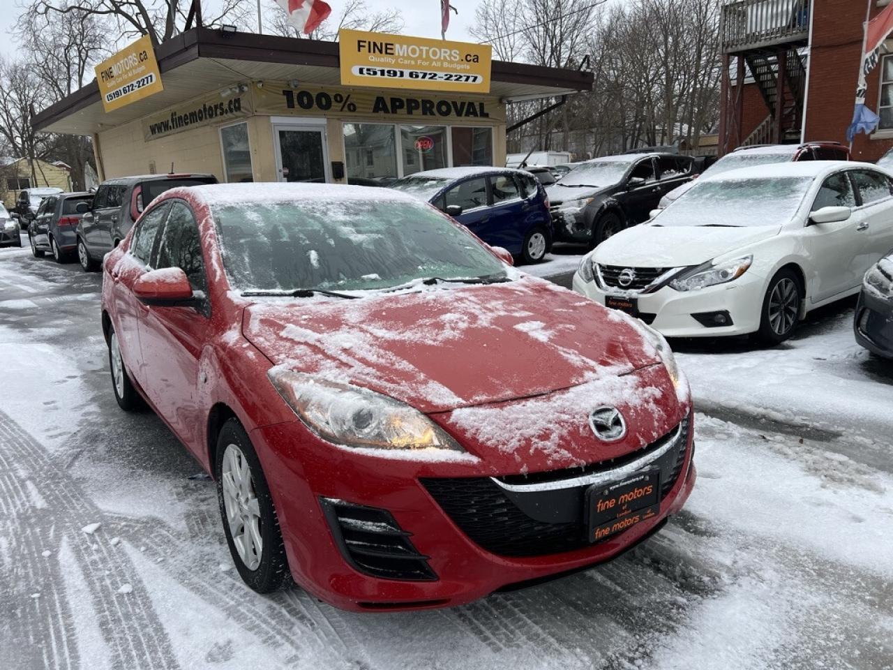 2010 Mazda MAZDA3 4dr Sedan Automatic GX Photo