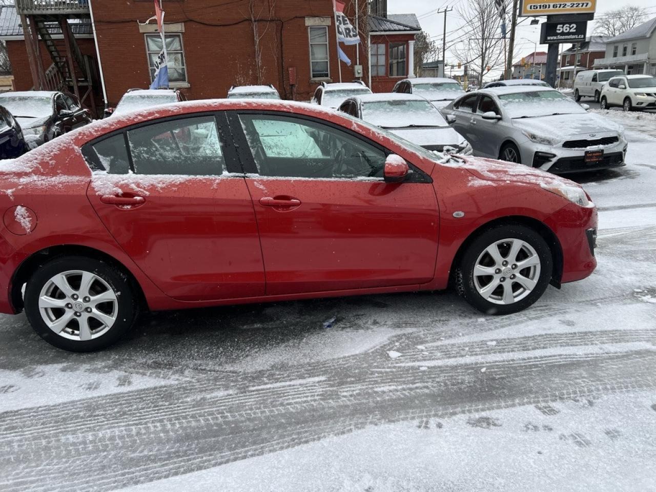 2010 Mazda MAZDA3 4dr Sedan Automatic GX Photo