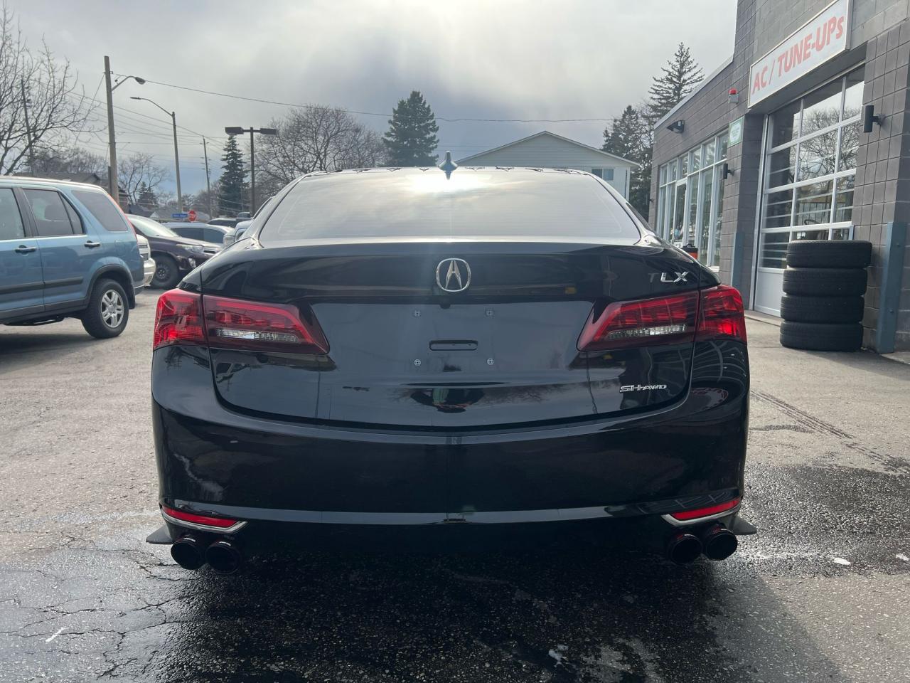 2017 Acura TLX 4dr Sdn SH-AWD V6 Performance Exhaust Photo