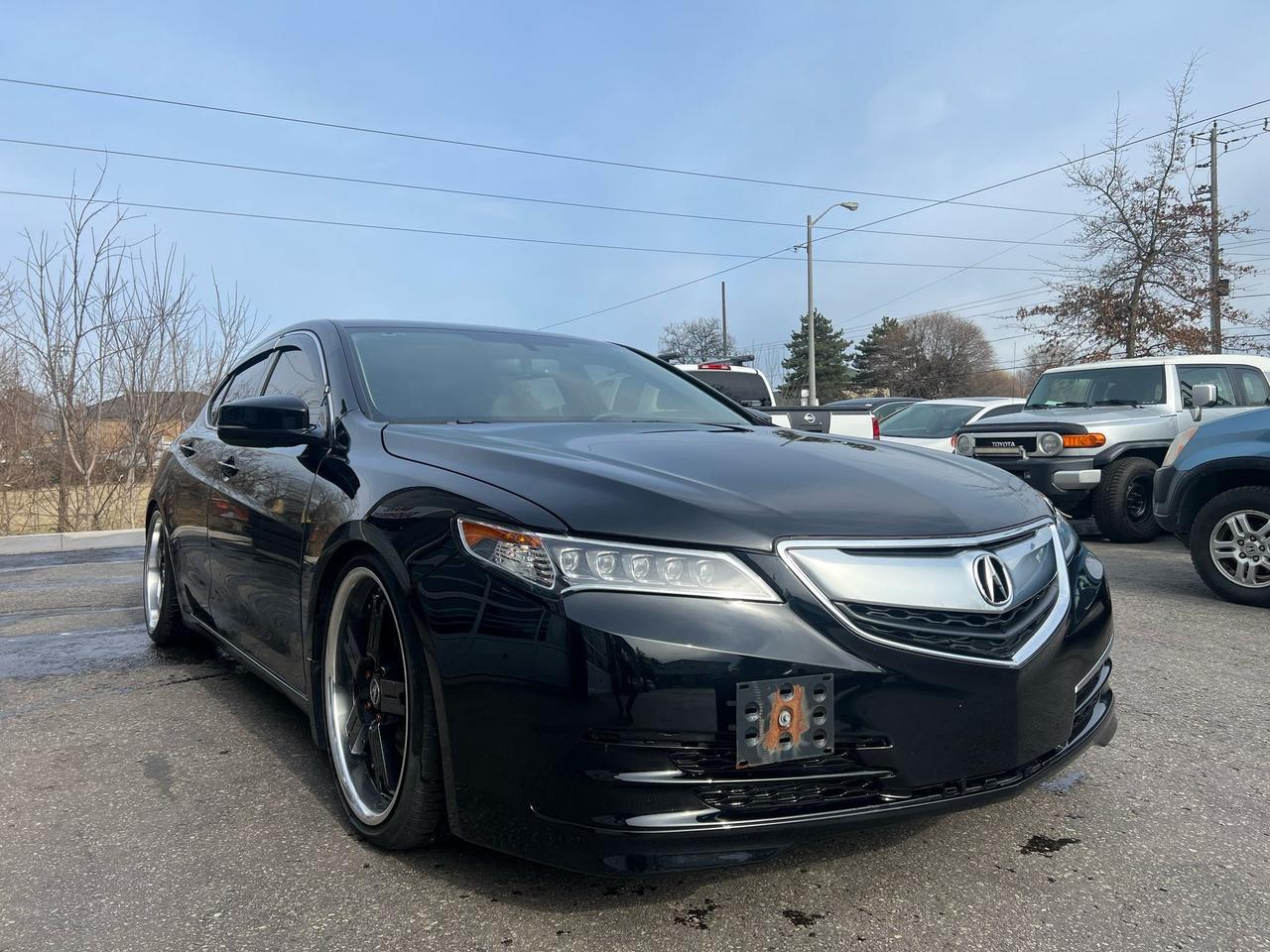 2017 Acura TLX 4dr Sdn SH-AWD V6 Performance Exhaust Photo