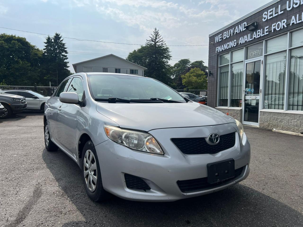 2010 Toyota Corolla 4dr Sdn Man CE • Well Serviced Photo2