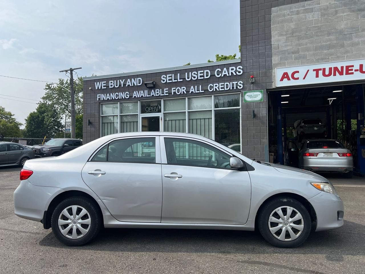 2010 Toyota Corolla 4dr Sdn Man CE • Well Serviced Photo3