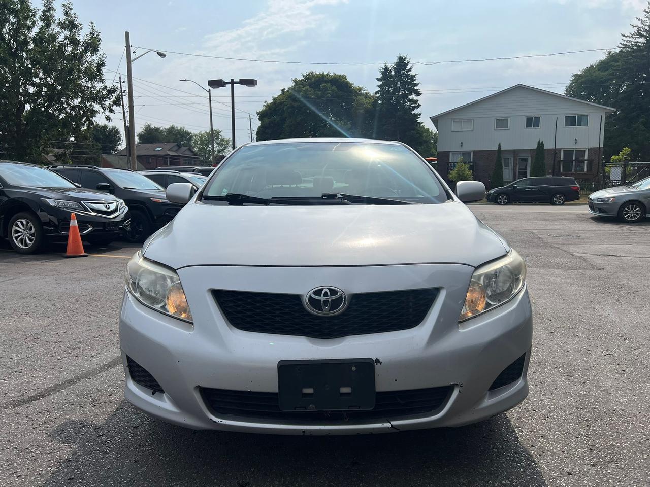 2010 Toyota Corolla 4dr Sdn Man CE • Well Serviced Photo