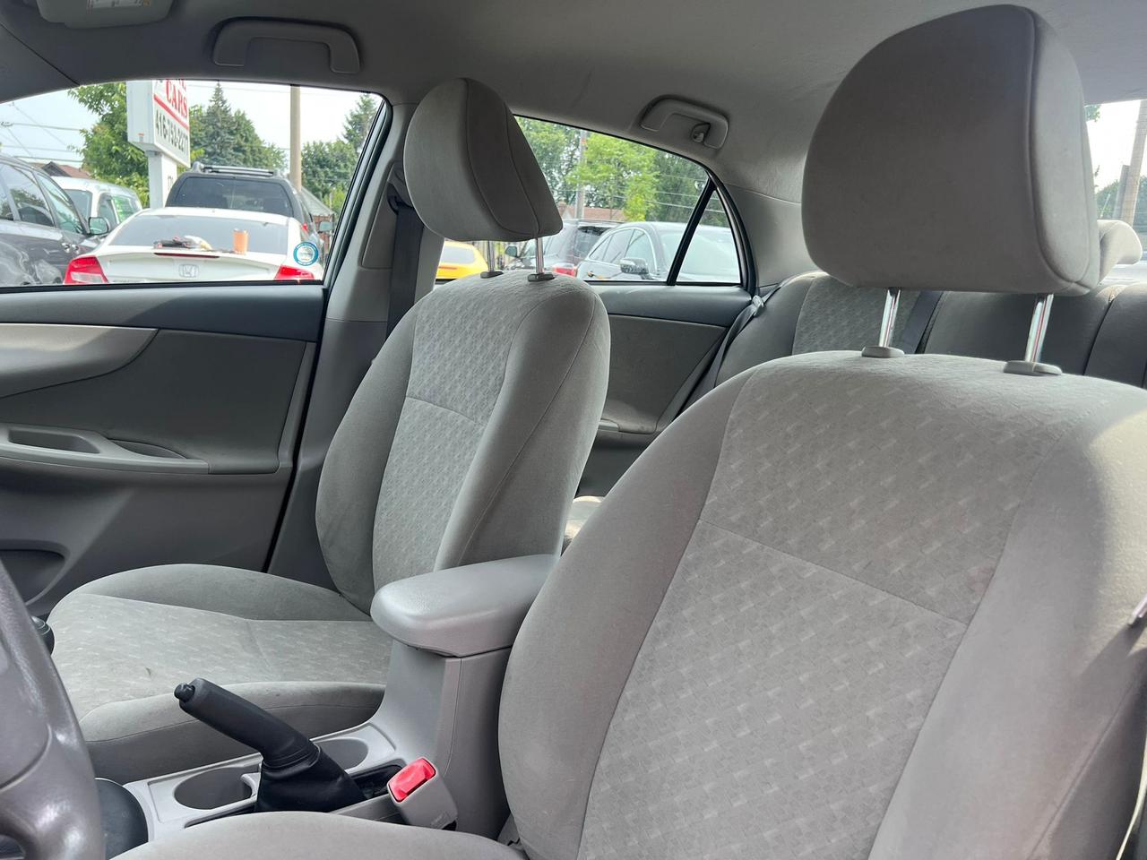 2010 Toyota Corolla 4dr Sdn Man CE • Well Serviced Photo