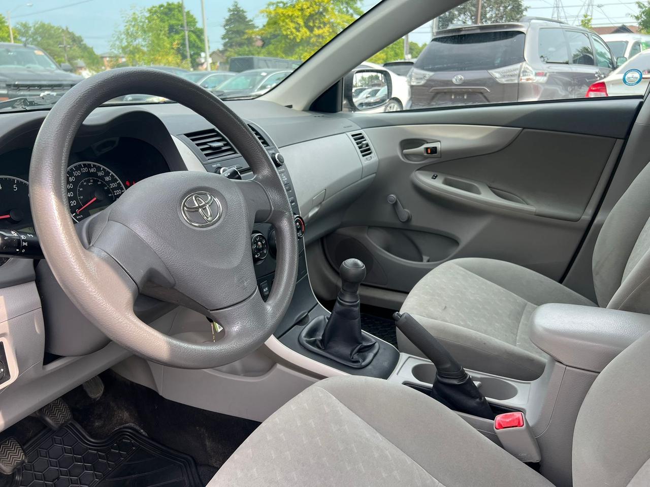 2010 Toyota Corolla 4dr Sdn Man CE • Well Serviced Photo