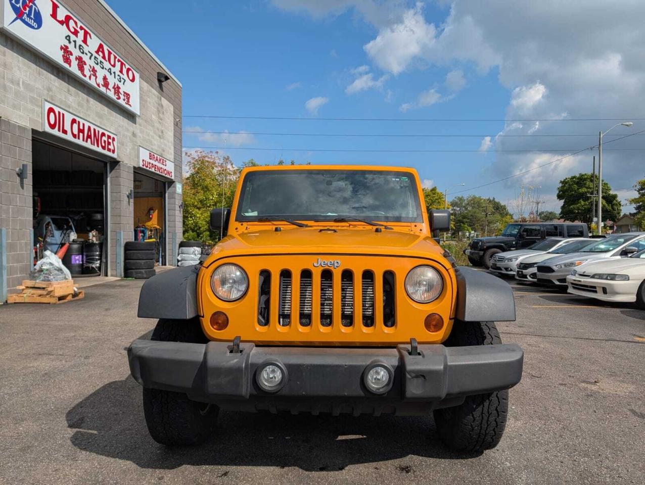 2012 Jeep WRANGLER UNLIMITED 4WD 4dr Sport Photo