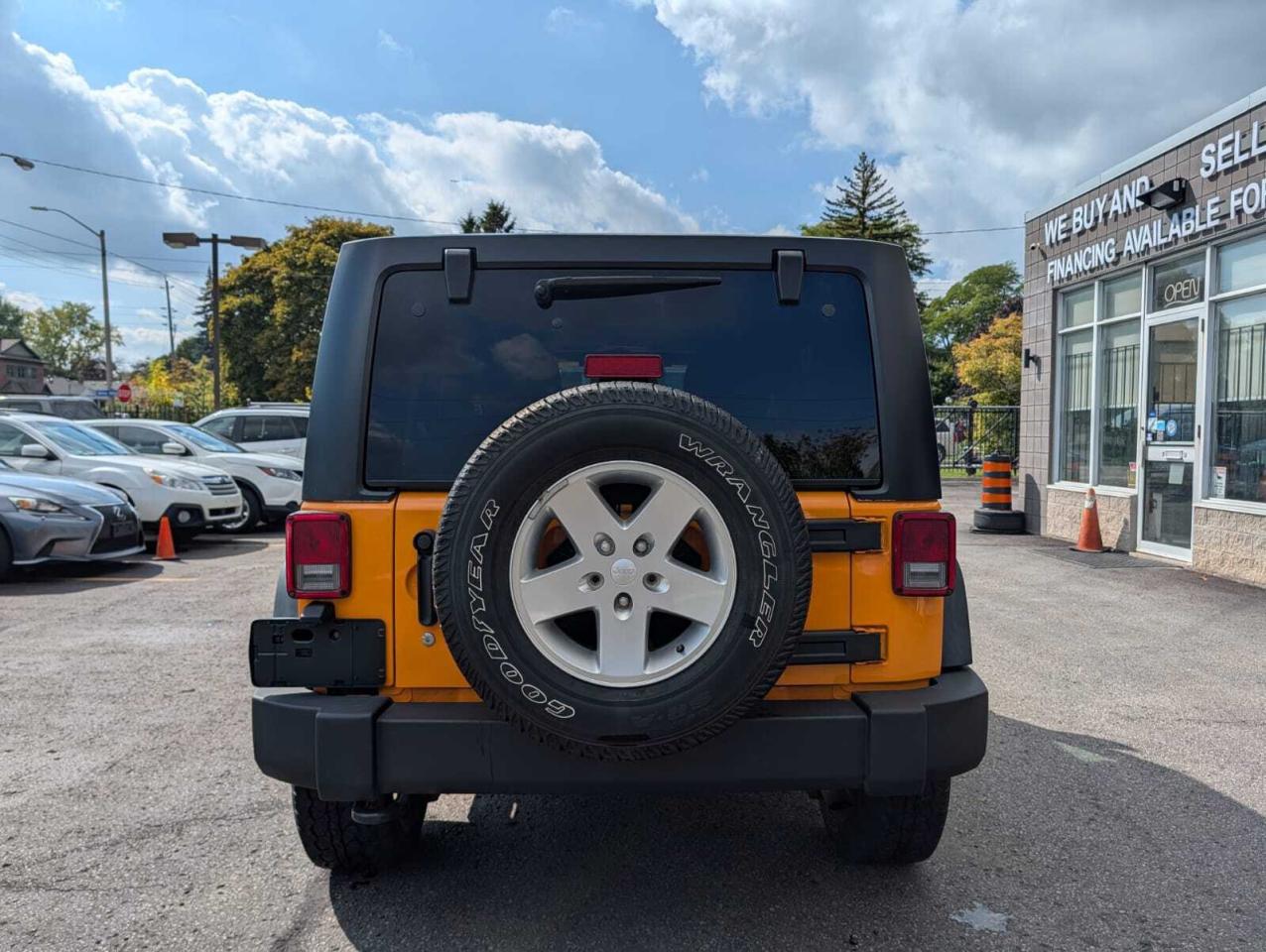 2012 Jeep WRANGLER UNLIMITED 4WD 4dr Sport Photo