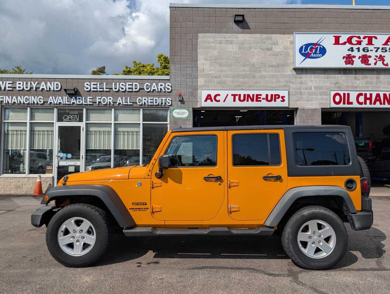2012 Jeep WRANGLER UNLIMITED 4WD 4dr Sport Photo