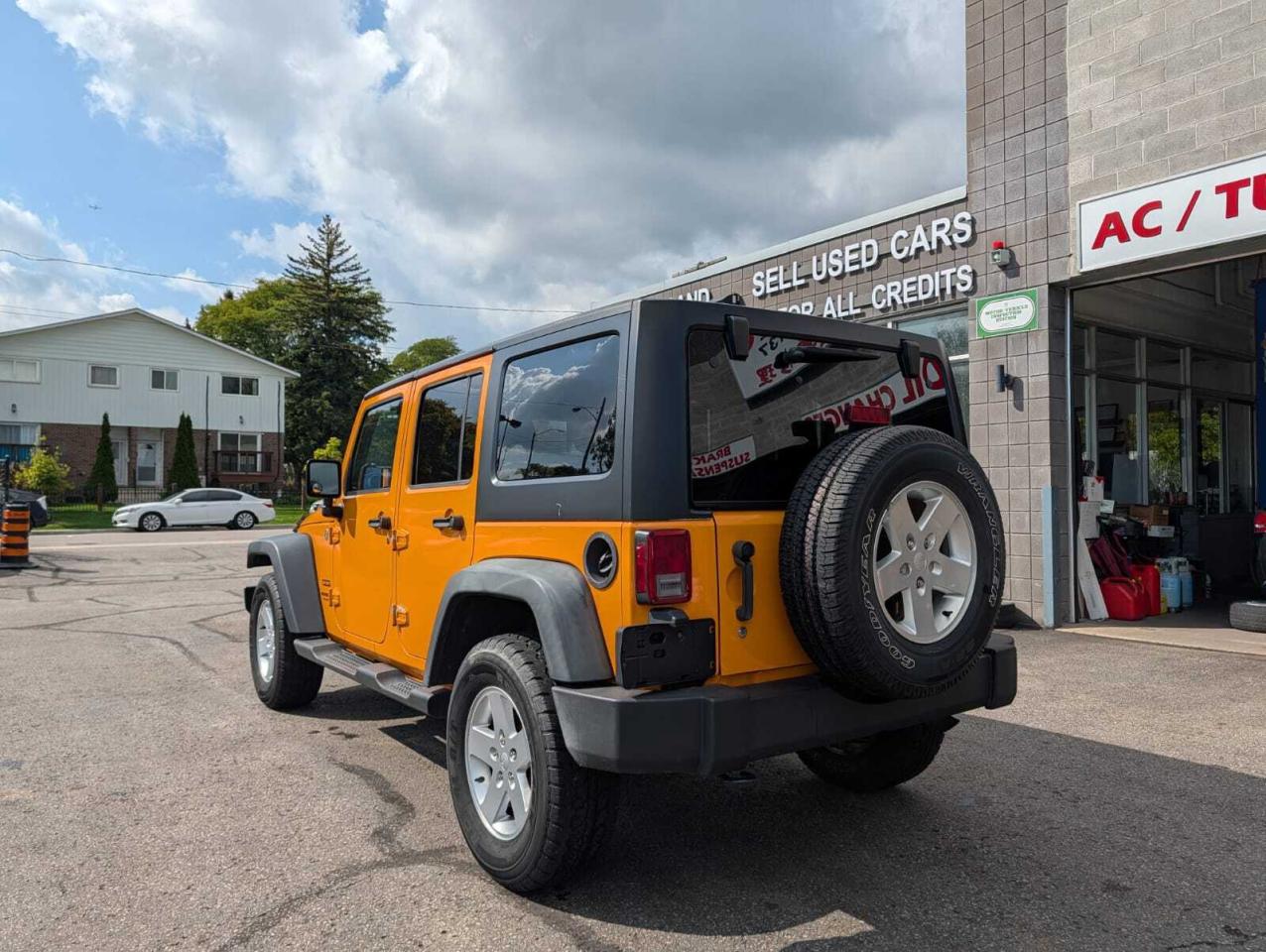 2012 Jeep WRANGLER UNLIMITED 4WD 4dr Sport Photo