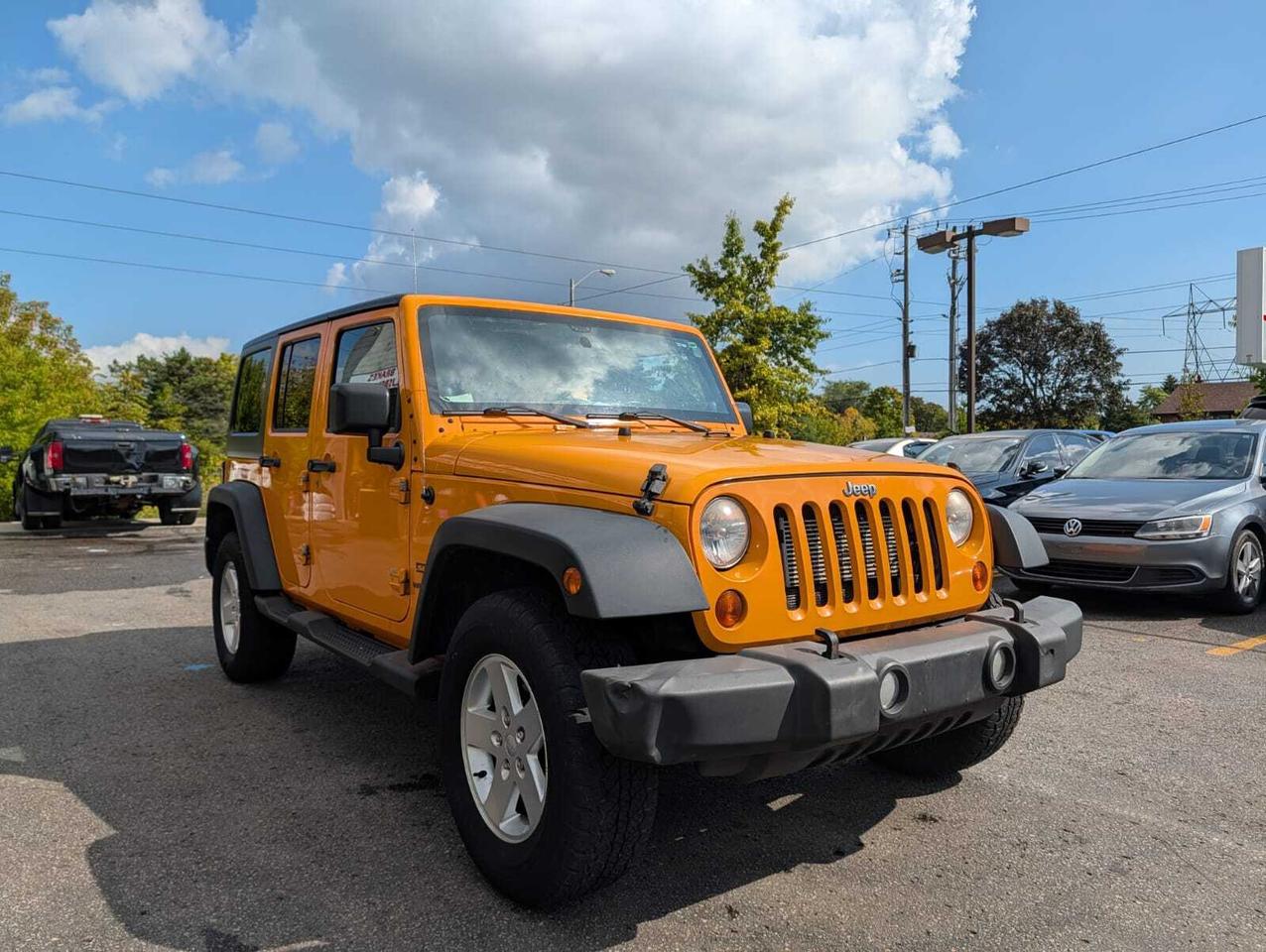 2012 Jeep WRANGLER UNLIMITED 4WD 4dr Sport Photo