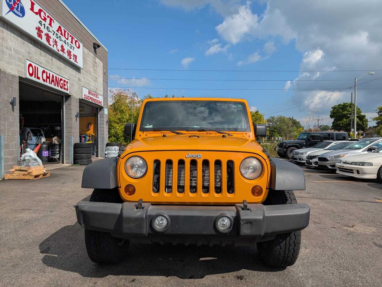 2012 Jeep WRANGLER UNLIMITED 4WD 4dr Sport Photo