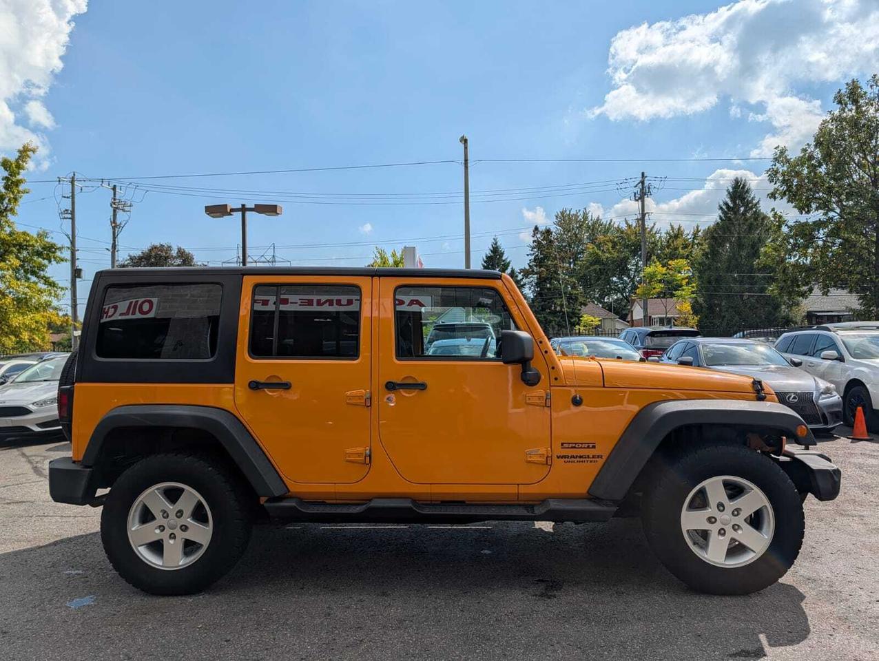 2012 Jeep WRANGLER UNLIMITED 4WD 4dr Sport Photo3