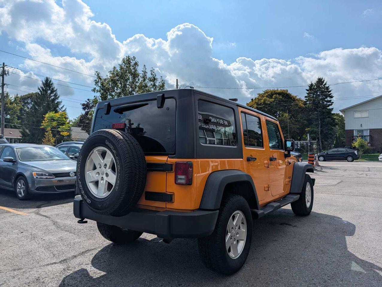 2012 Jeep WRANGLER UNLIMITED 4WD 4dr Sport Photo