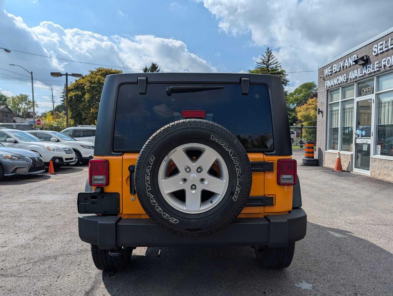 2012 Jeep WRANGLER UNLIMITED 4WD 4dr Sport Photo