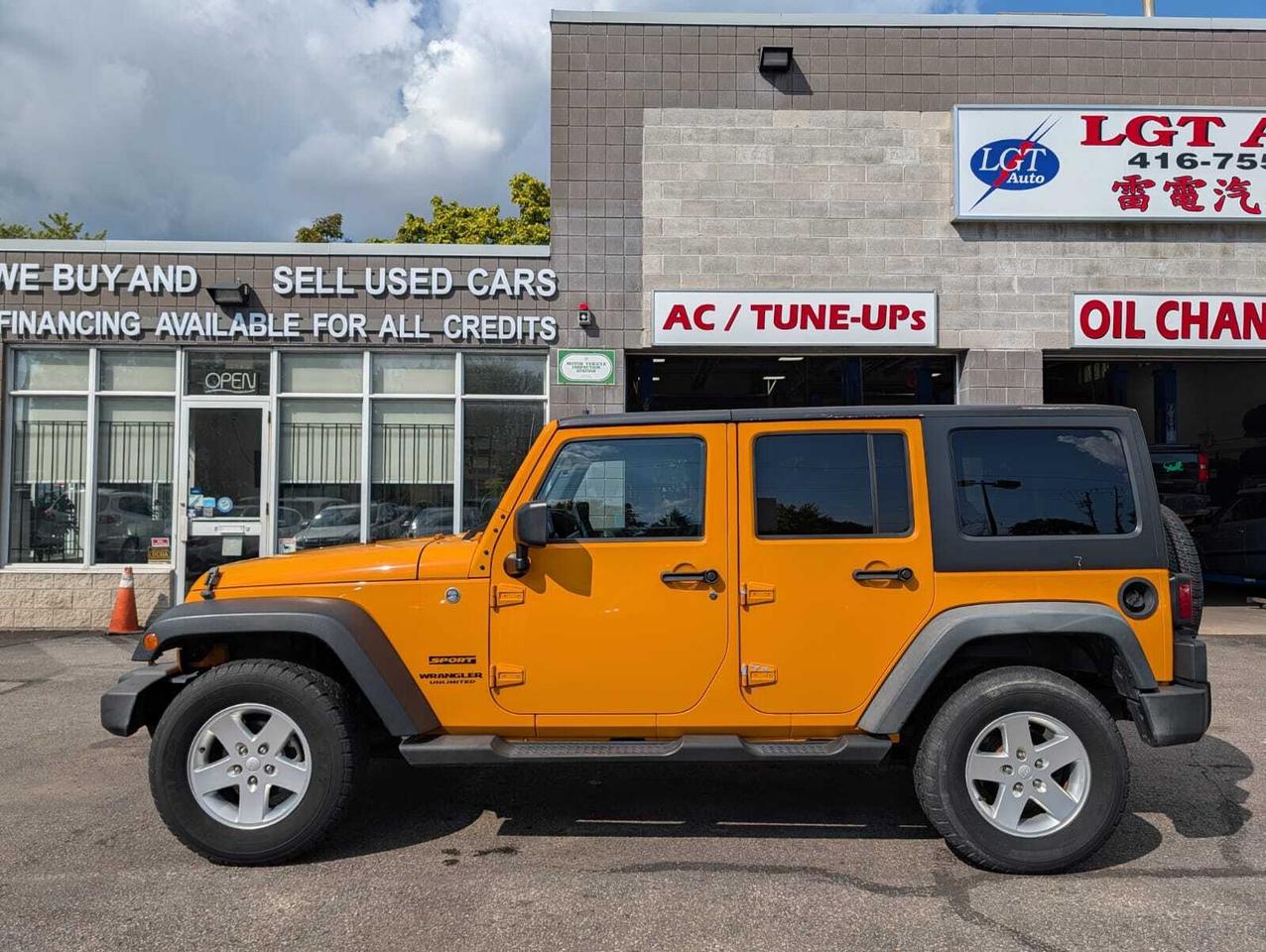 2012 Jeep WRANGLER UNLIMITED 4WD 4dr Sport Photo
