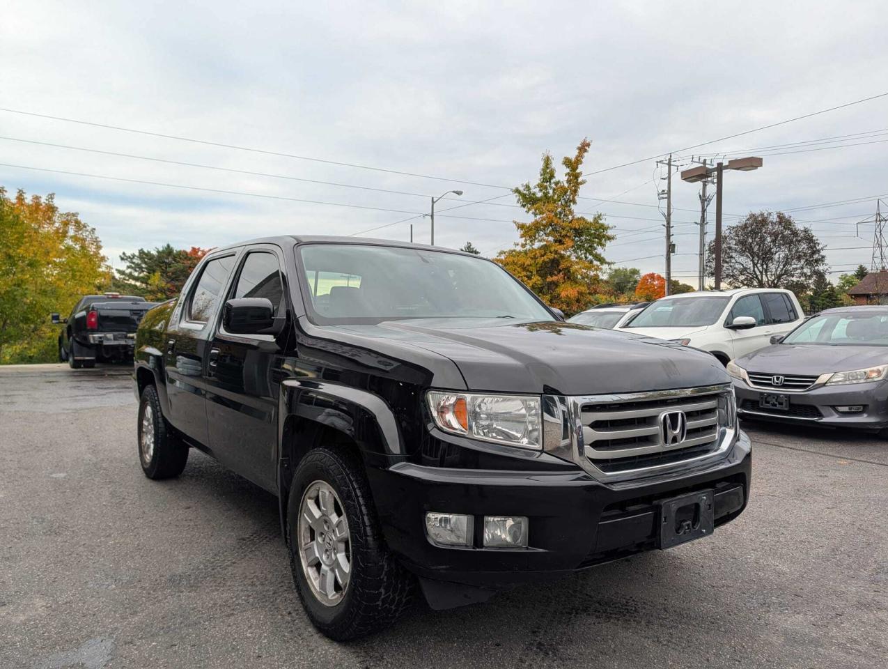 2013 Honda Ridgeline 4WD Crew Cab VP Photo