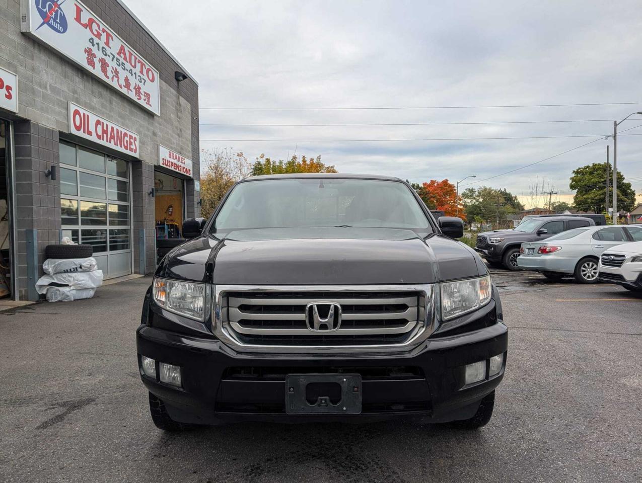 2013 Honda Ridgeline 4WD Crew Cab VP Photo