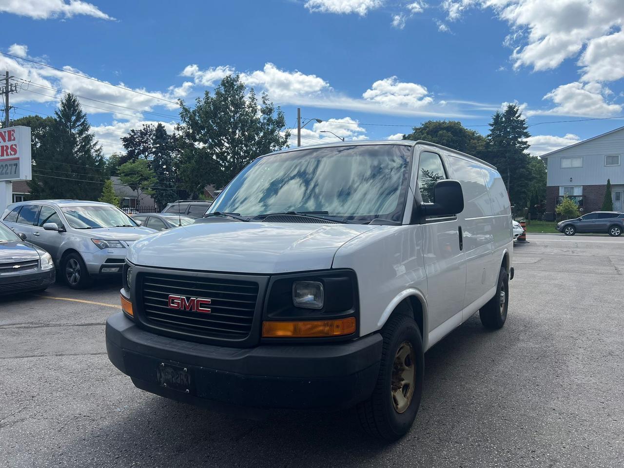 2013 GMC Savana Cargo Van RWD 2500 • Accident Free Photo0