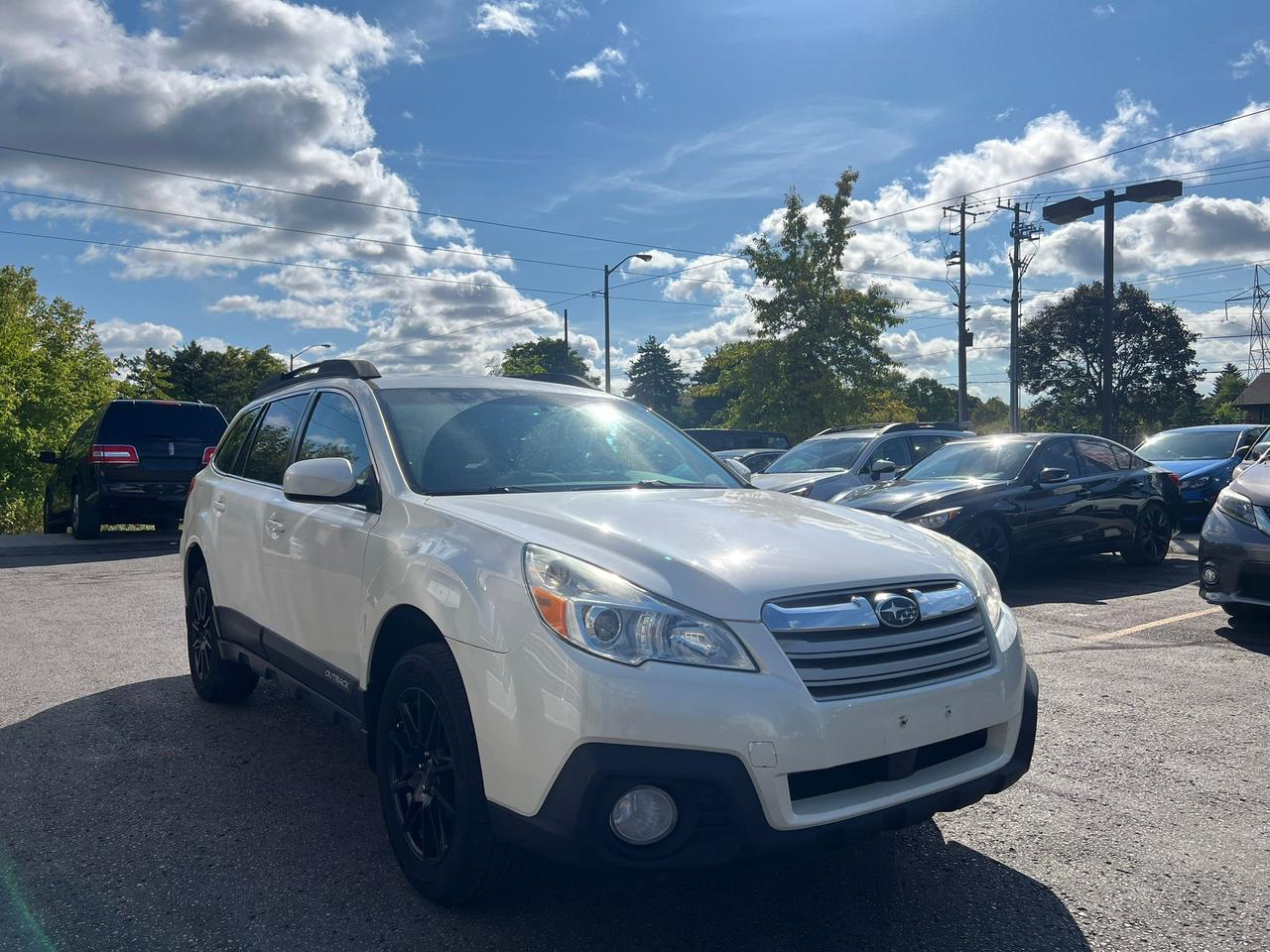 2014 Subaru Outback 4dr Wgn H4 Auto 2.5i Limited Photo