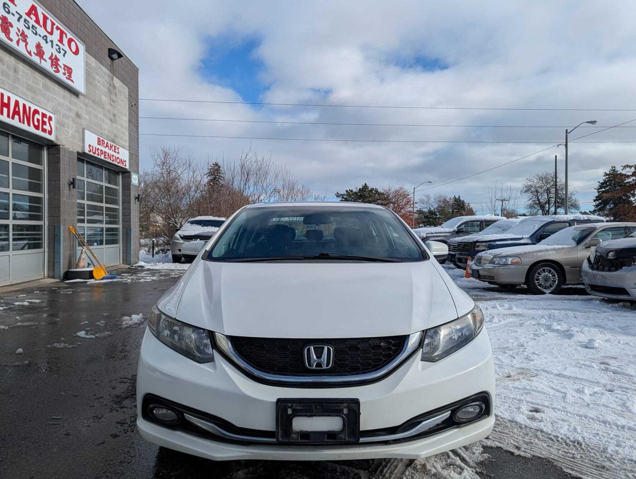 2014 Honda Civic Sedan 4dr CVT Touring • One Owner Photo