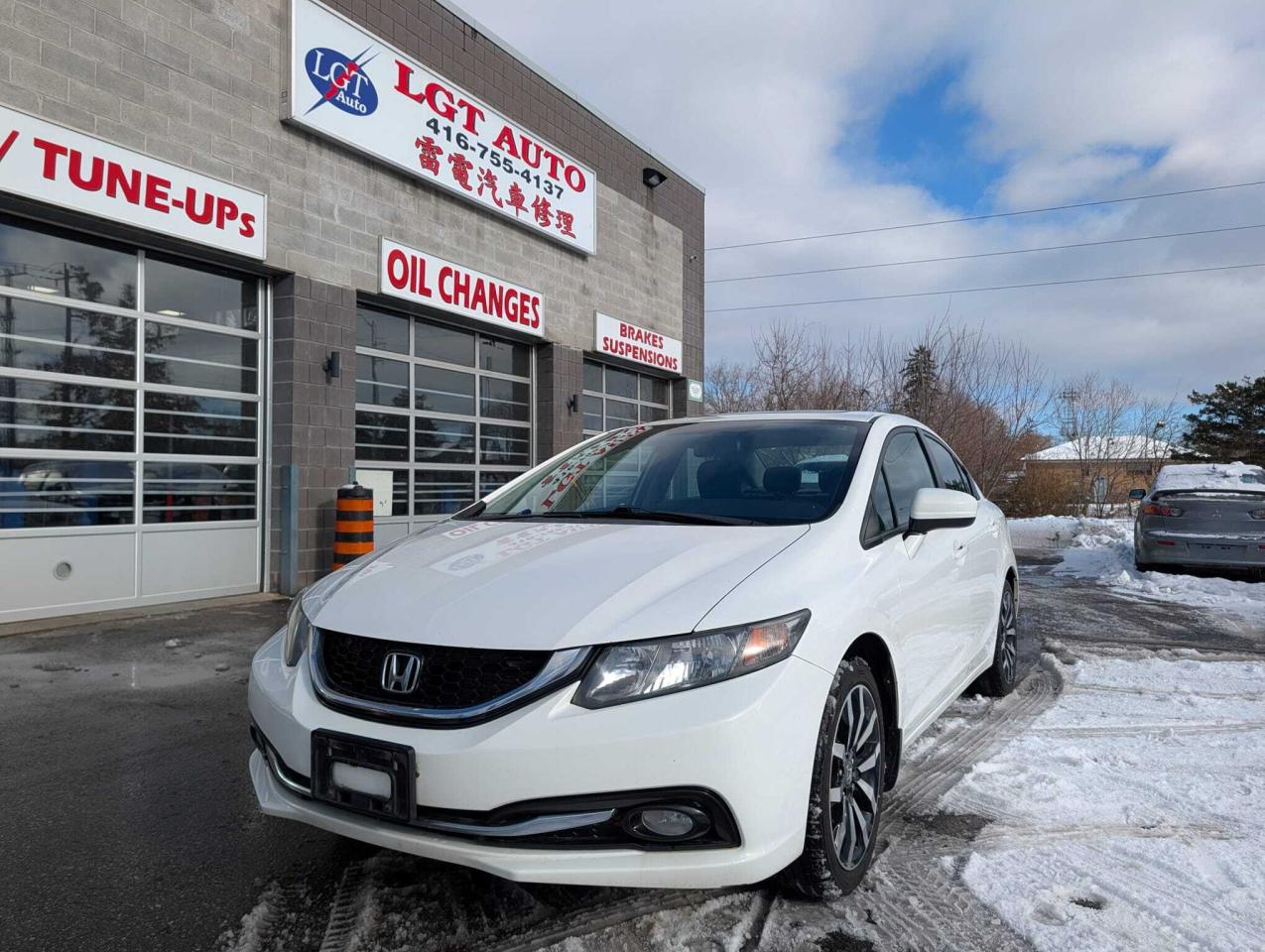 2014 Honda Civic Sedan 4dr CVT Touring • One Owner Photo0