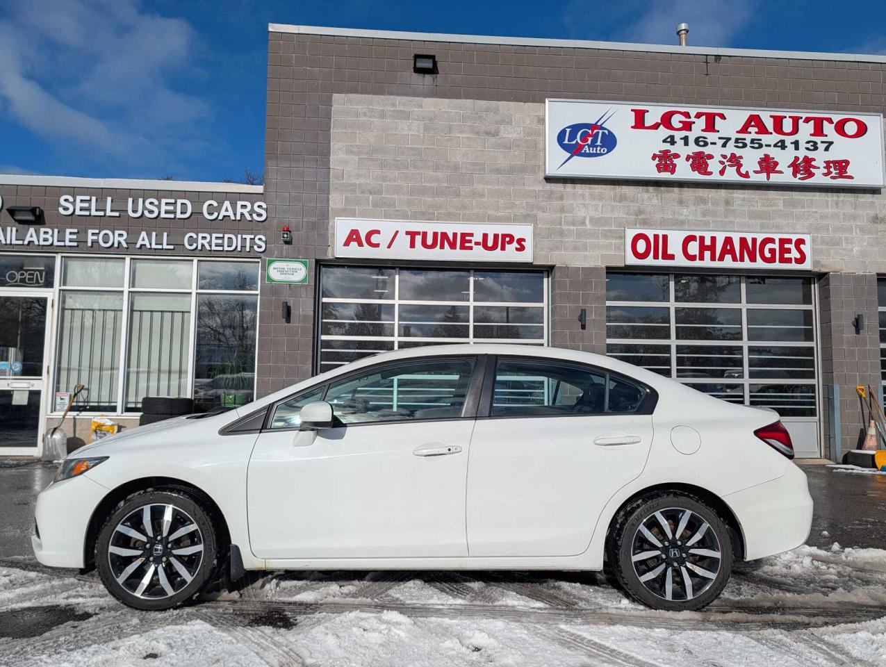 2014 Honda Civic Sedan 4dr CVT Touring • One Owner Photo