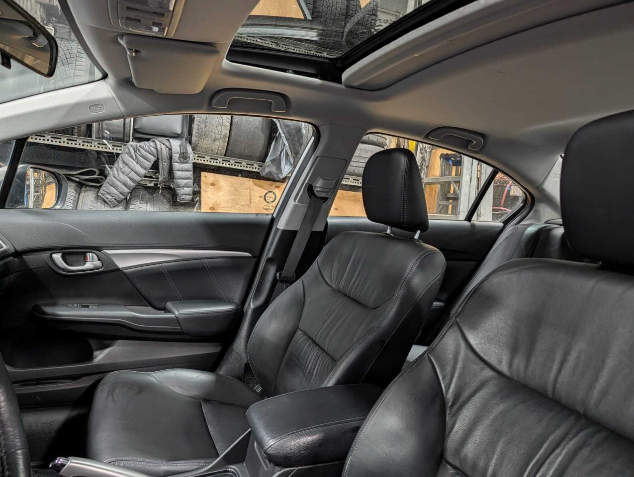 2014 Honda Civic Sedan 4dr CVT Touring • One Owner Photo