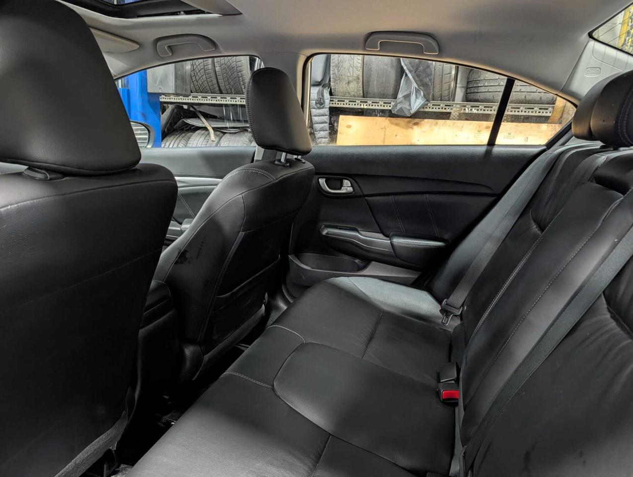 2014 Honda Civic Sedan 4dr CVT Touring • One Owner Photo