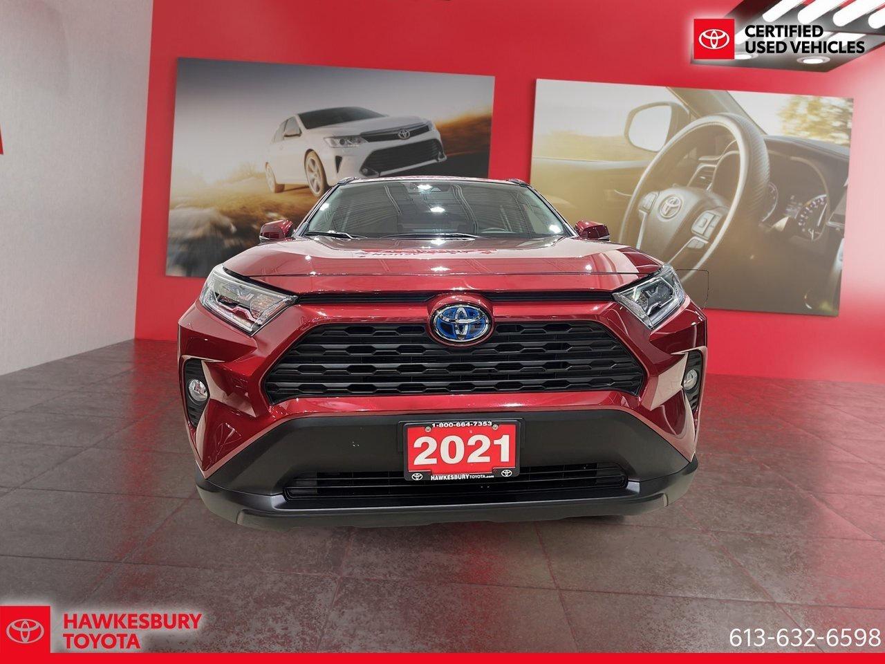 2021 Toyota RAV4 Hybrid XLE heated seats, a touchscreen system with Apple Photo2
