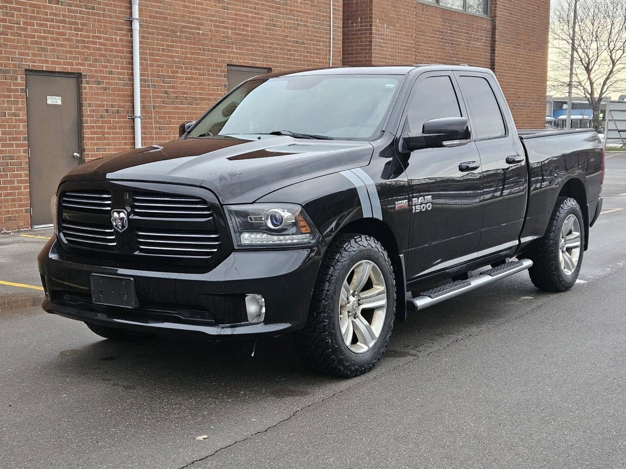 2014 RAM 1500 4WD Quad Cab 140.5 Sport, NO ACCIDENT Photo